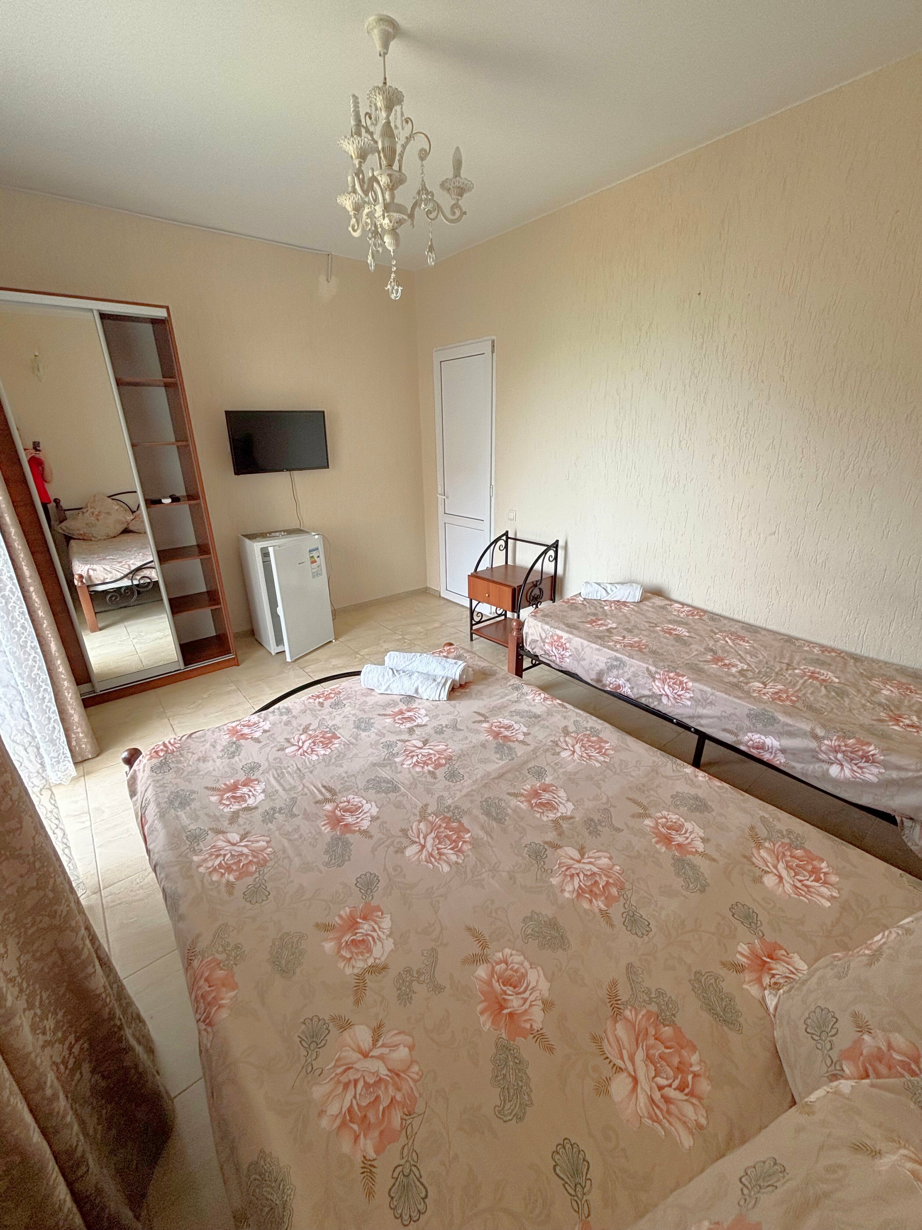 Трехместный номер с балконом