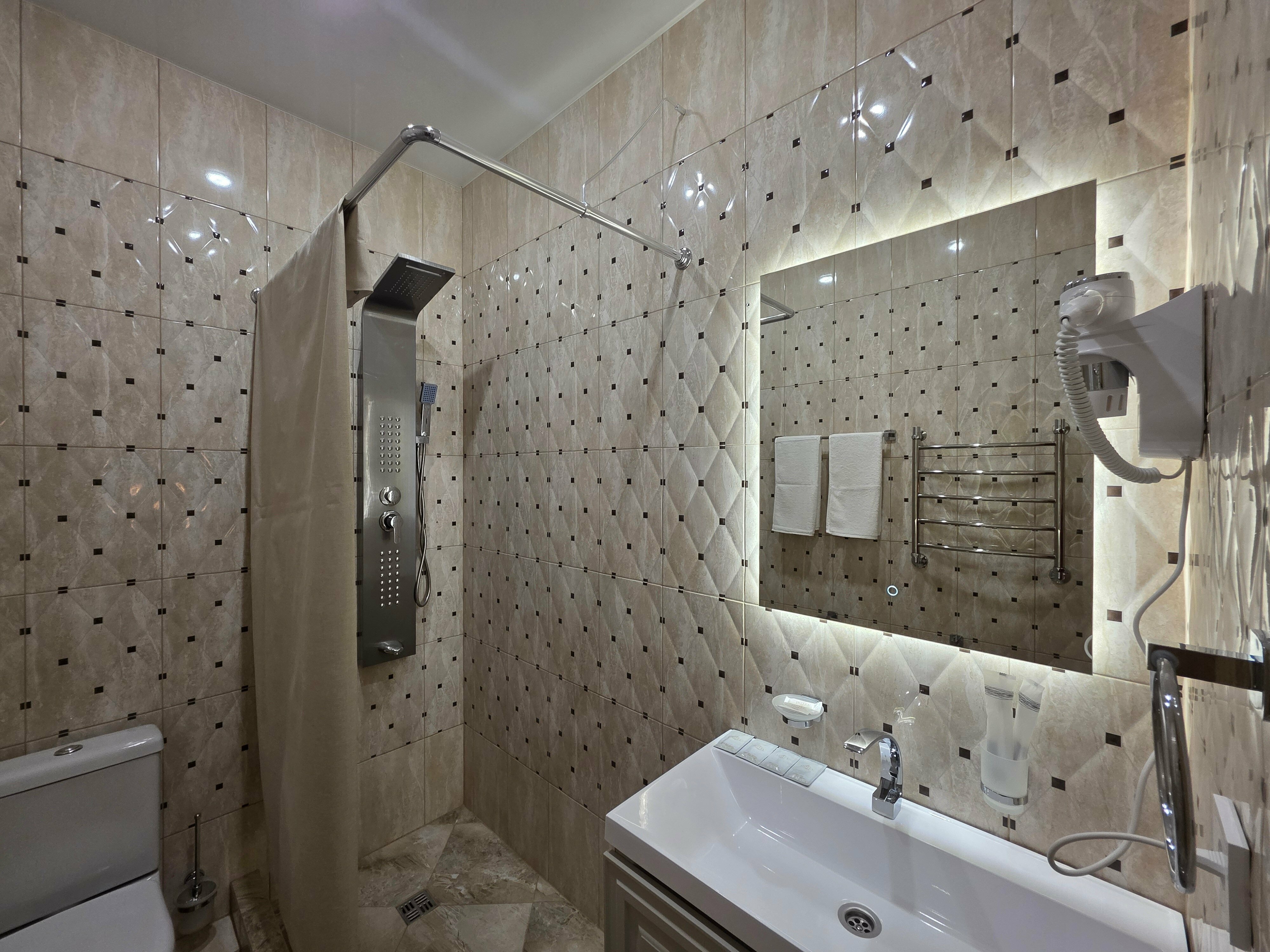 Премиум Люкс с кроватями TWIN/DBL и большой  террасой  с видом на горы