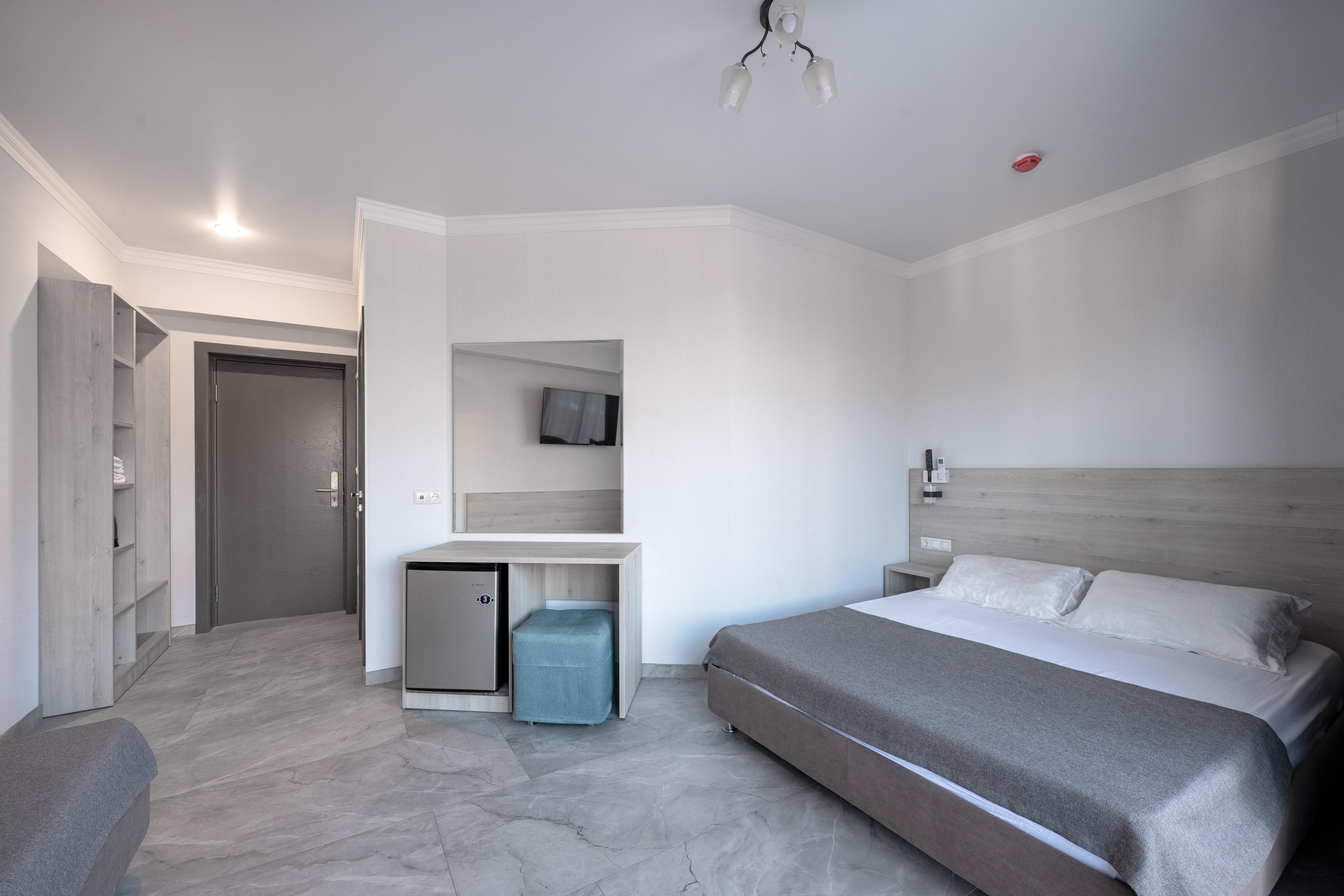 Трехместный номер с балконом