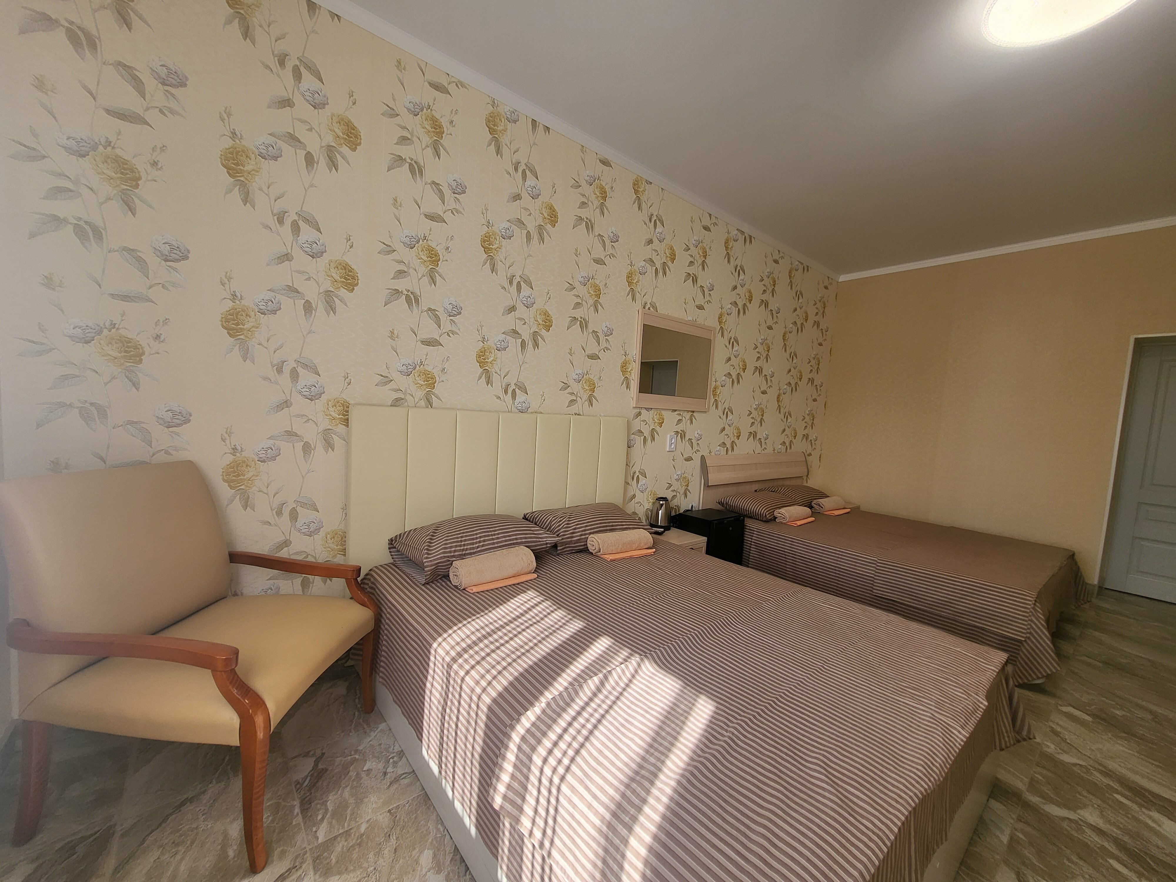 Улучшенный четырехместный номер