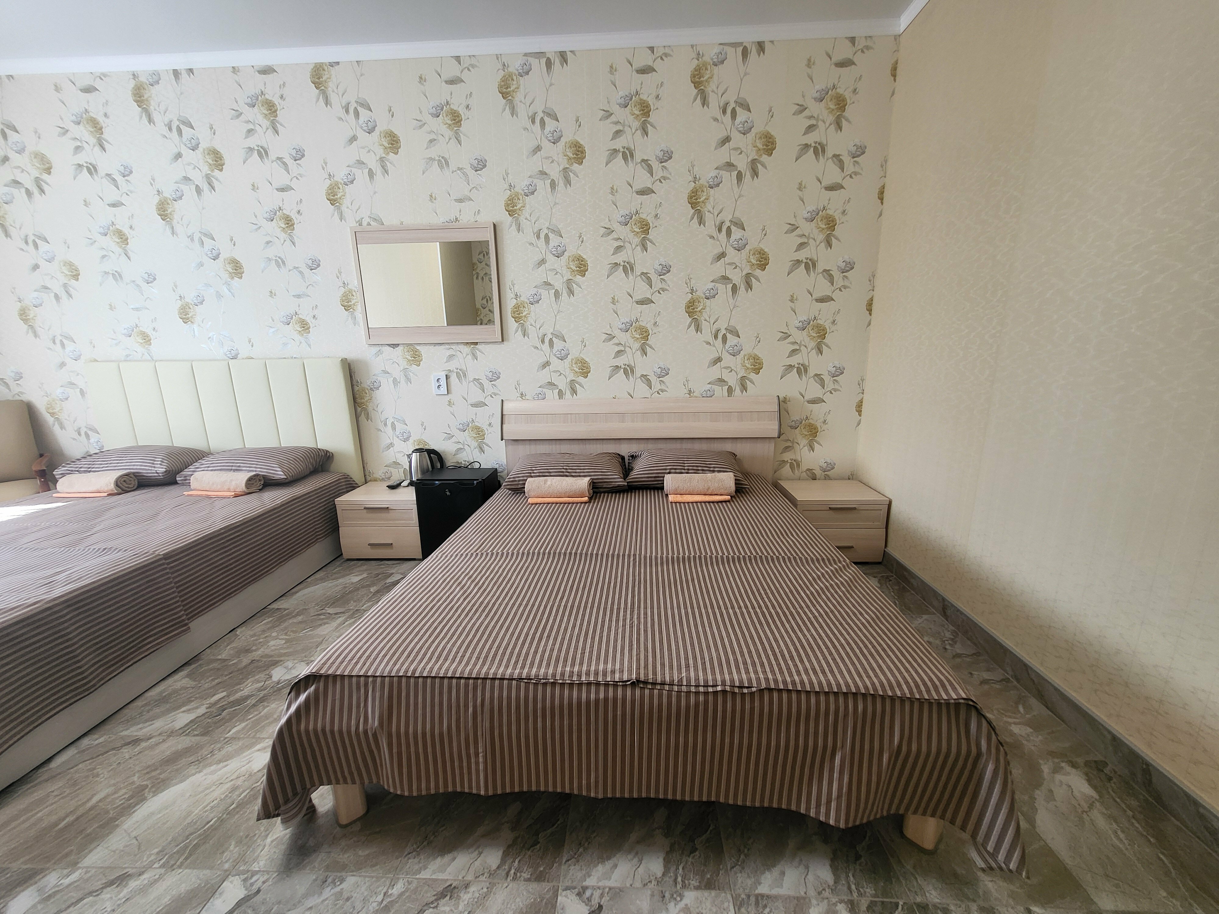 Улучшенный четырехместный номер