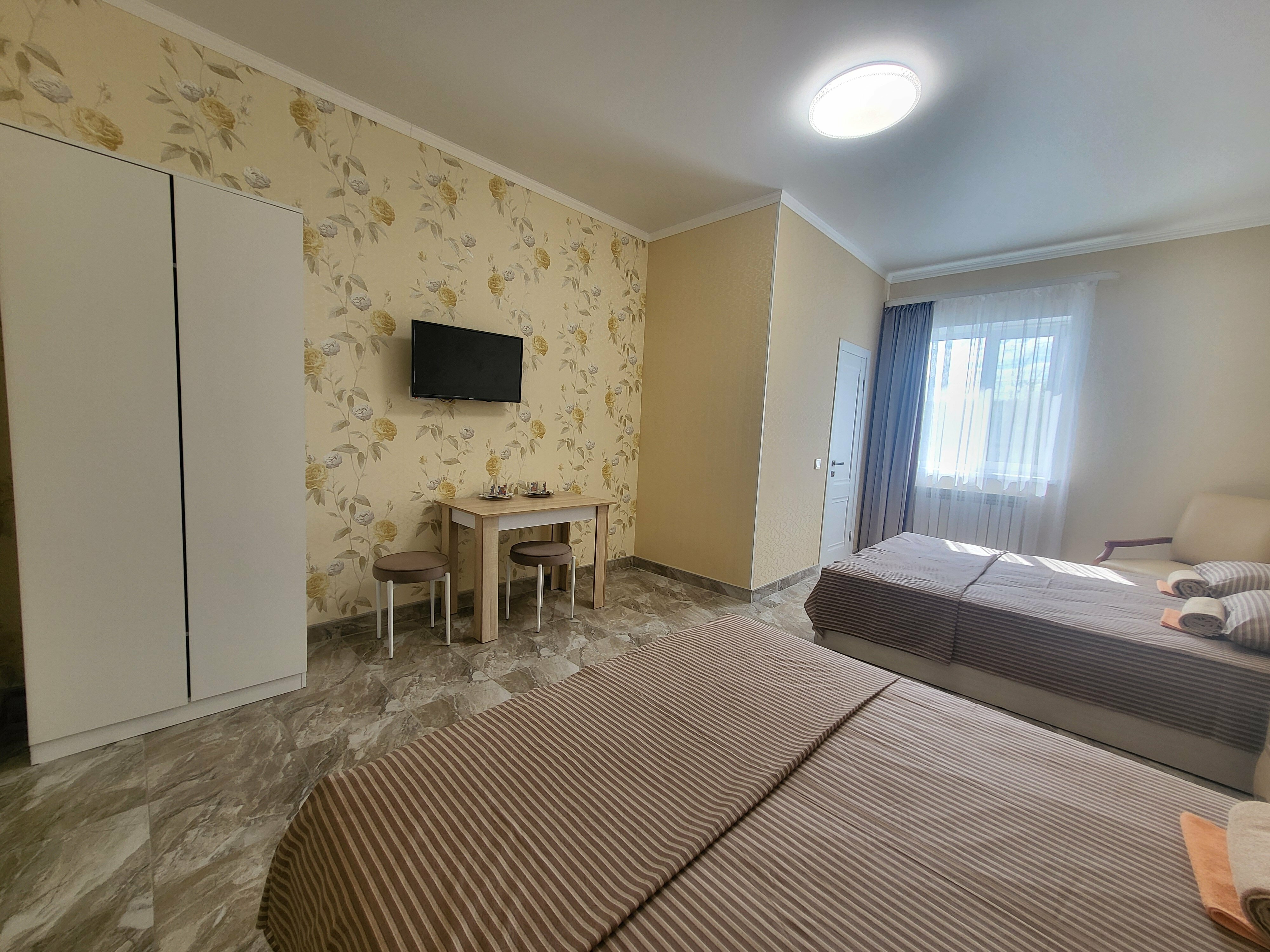 Улучшенный четырехместный номер