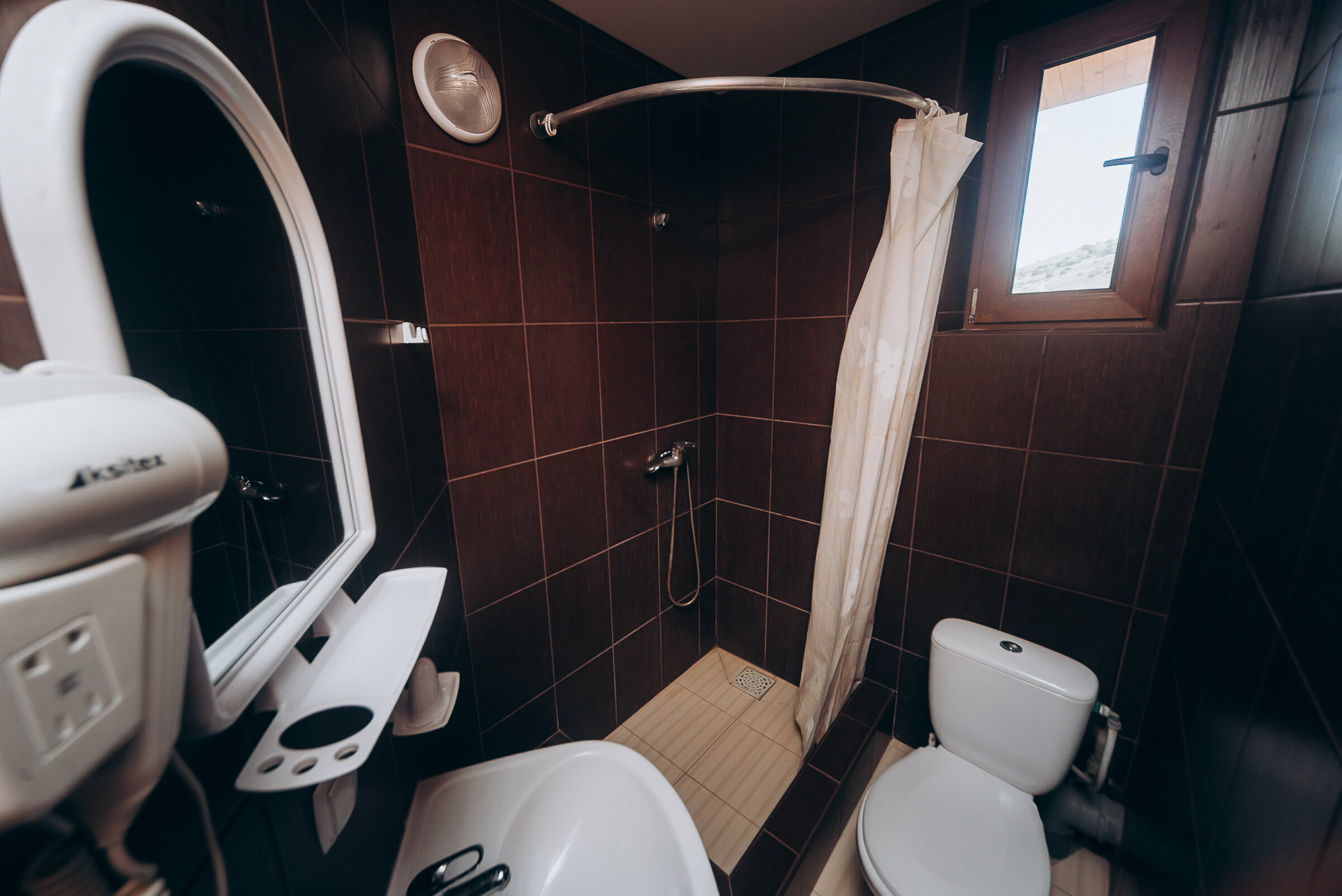 Трехместный номер с балконом