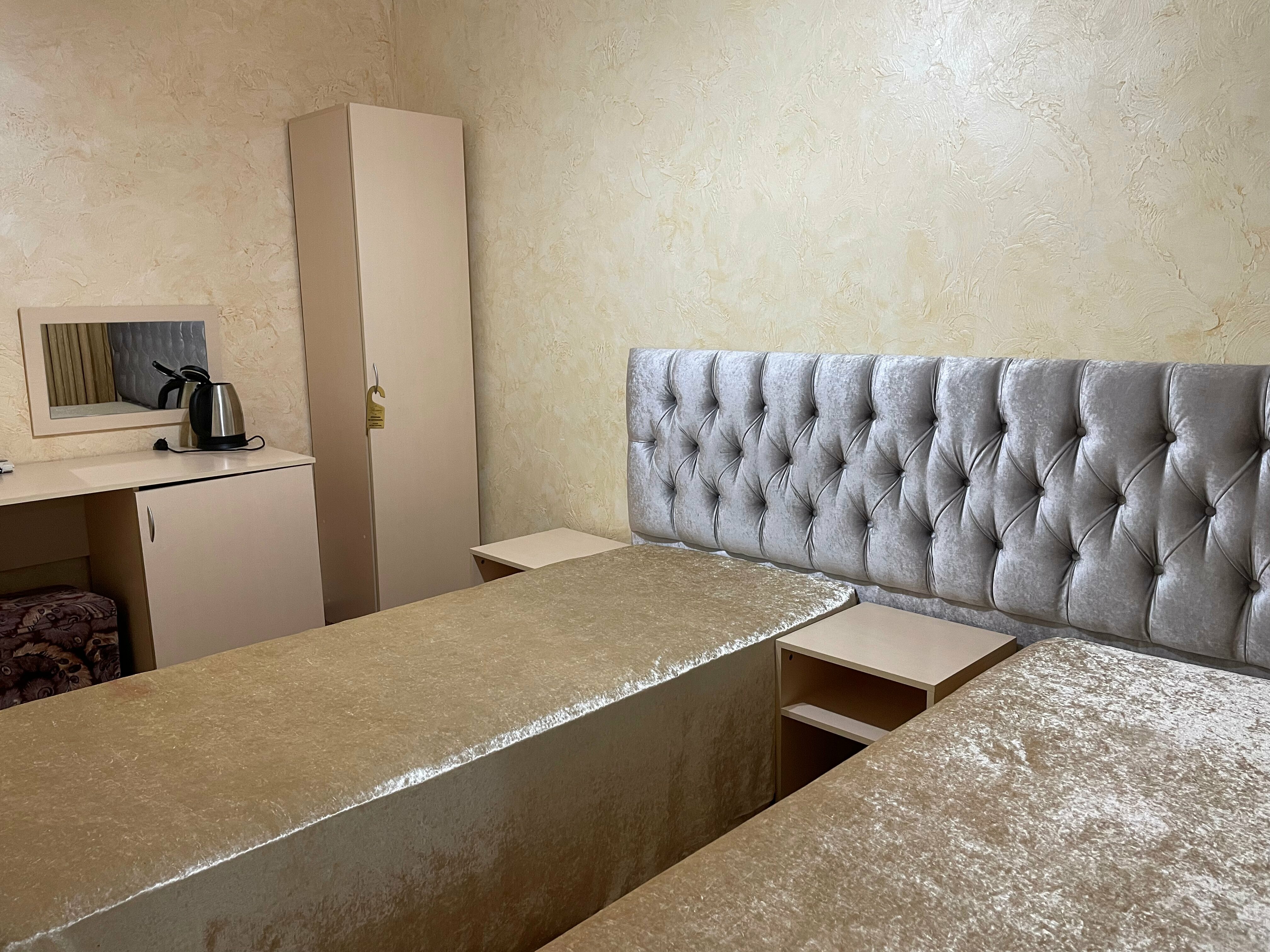 Двухместная комната с балконом (2 односпальные кровати)