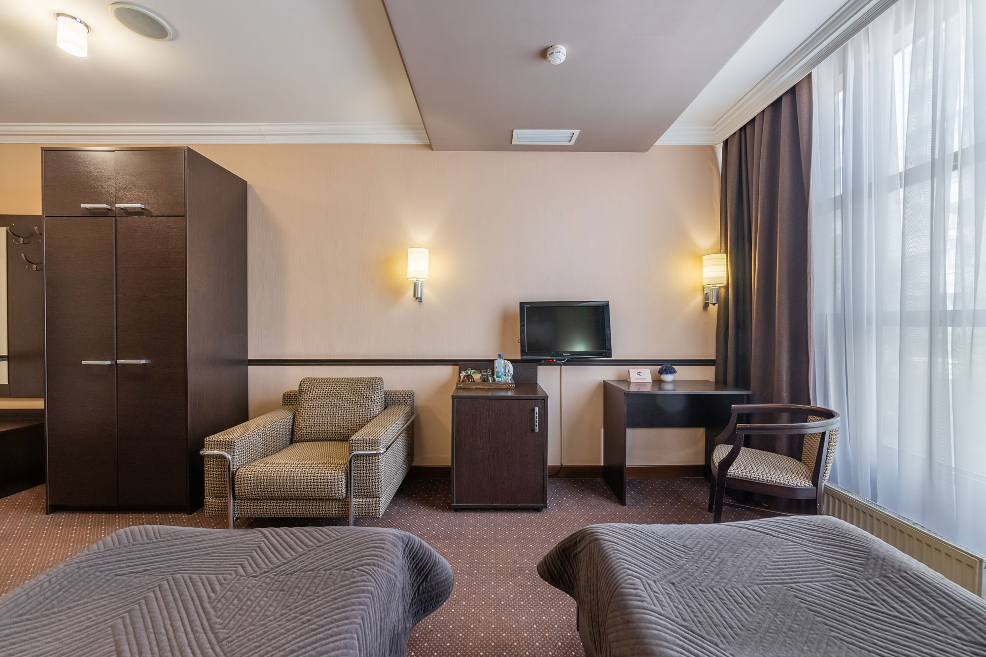 Улучшенный двухместный номер с 2 отдельными кроватями