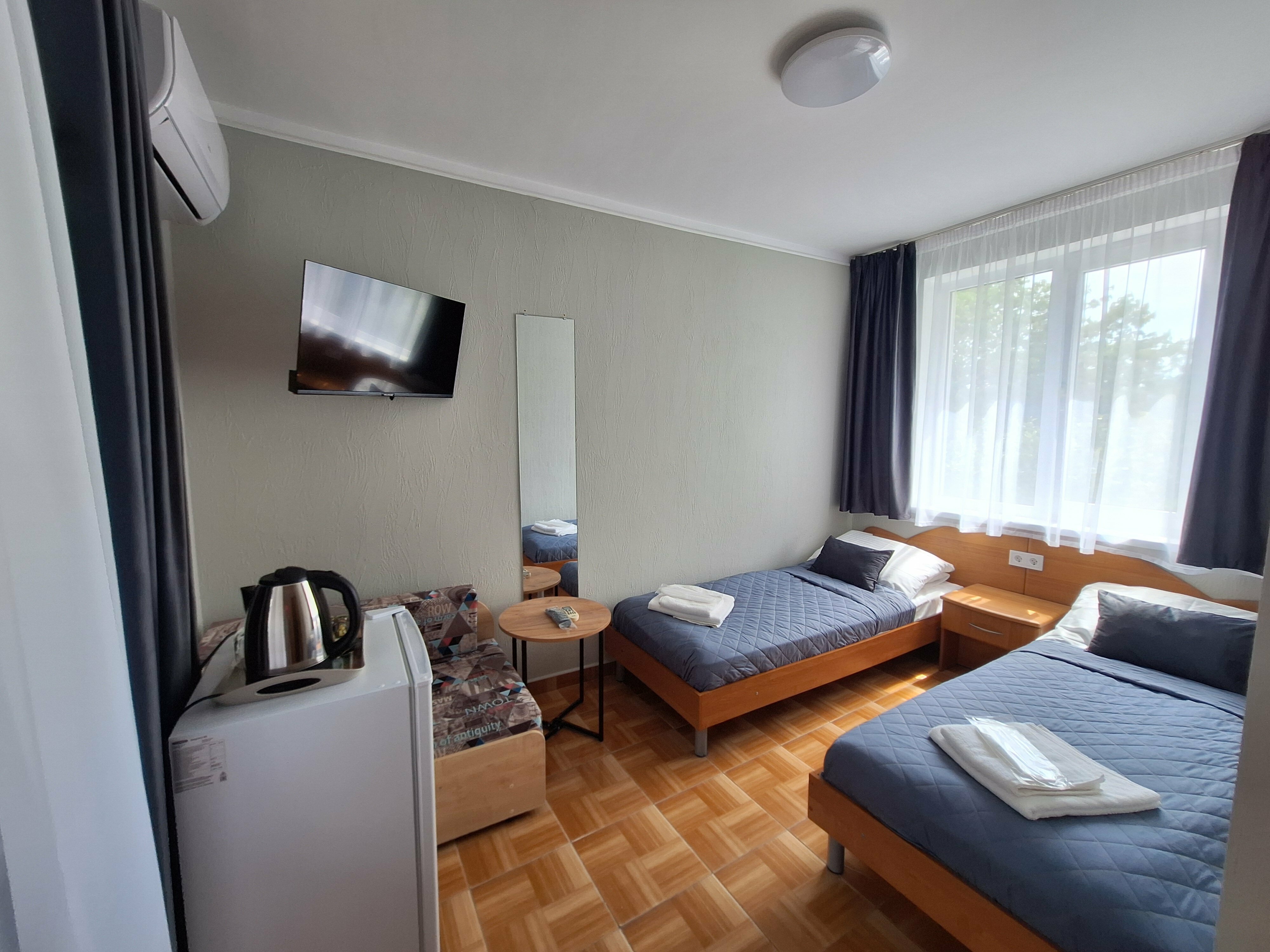 Улучшенный двухместный номер с 2 отдельными кроватями