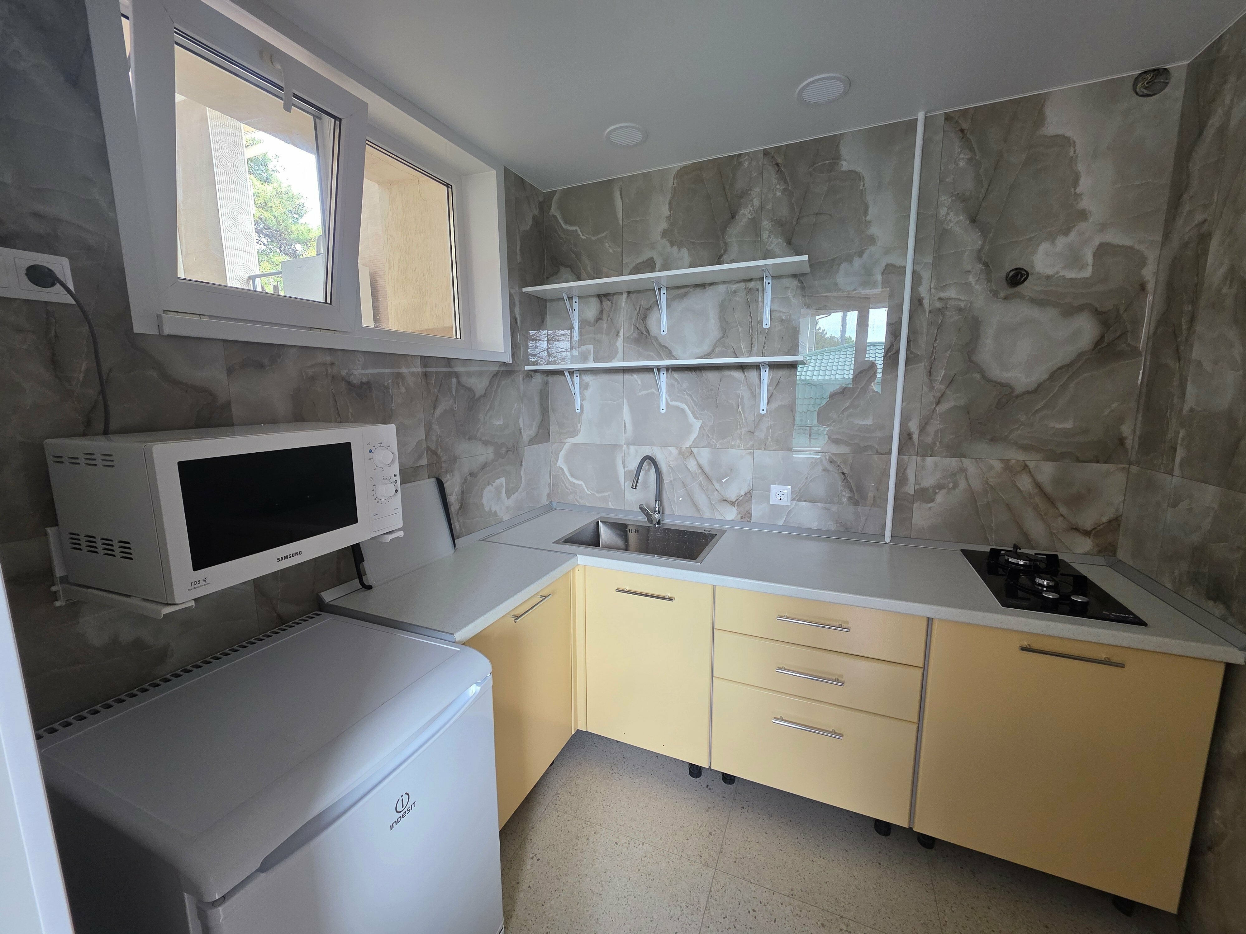 Трехместный номер с балконом