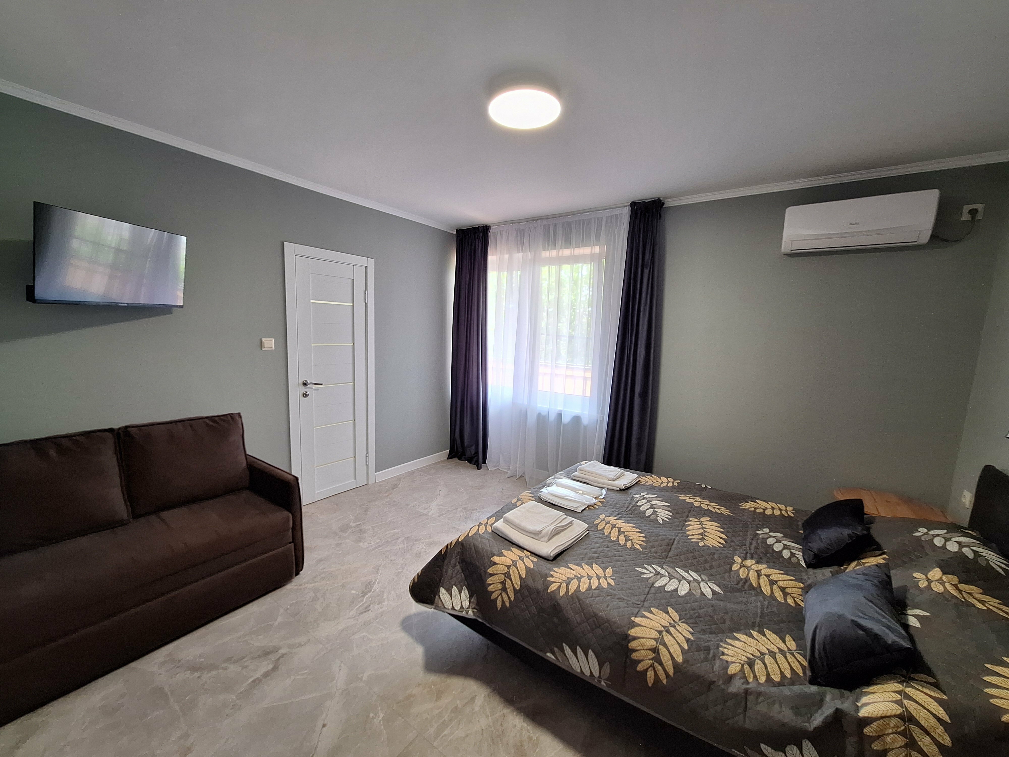 Трехместный номер с балконом