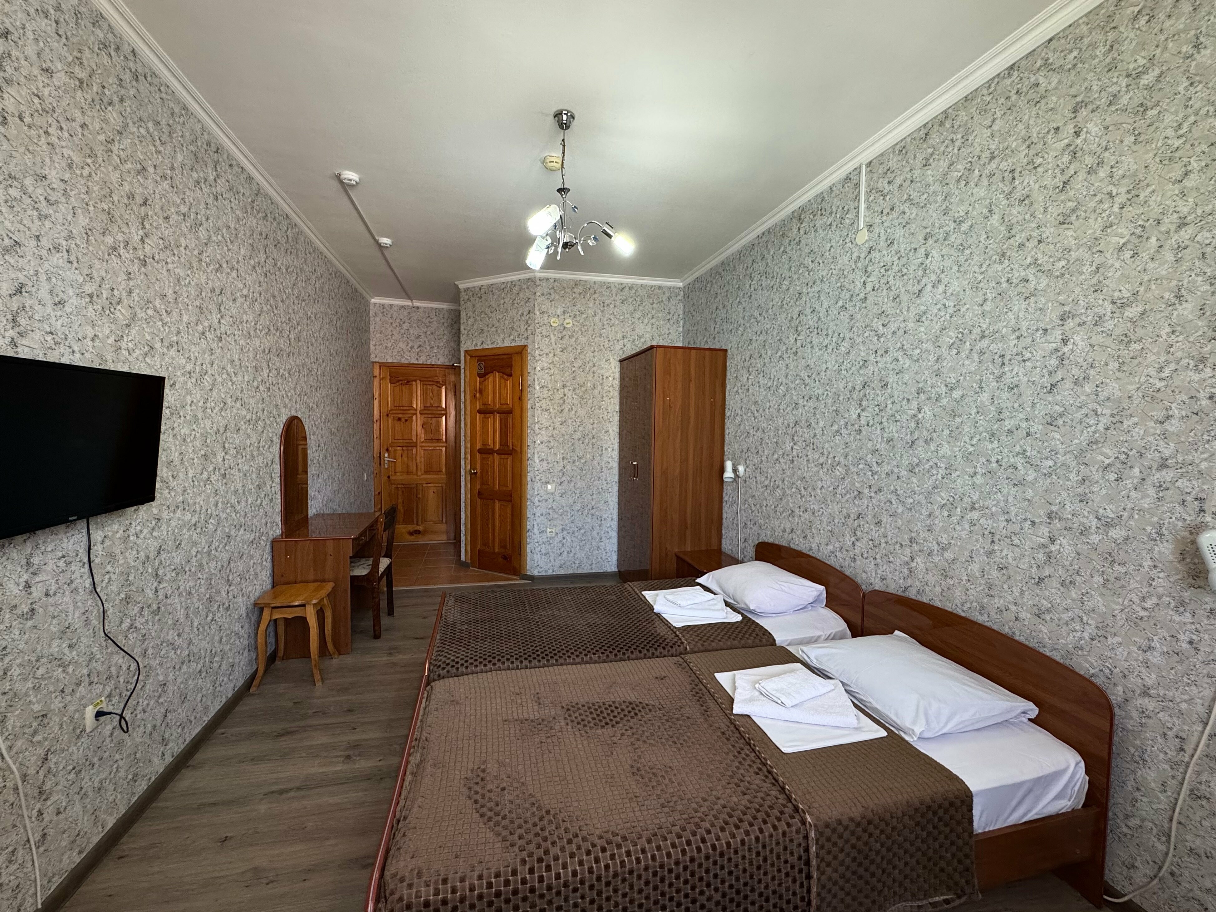 1-комнтаная двухместная с двумя односпальными кроватями и балконом