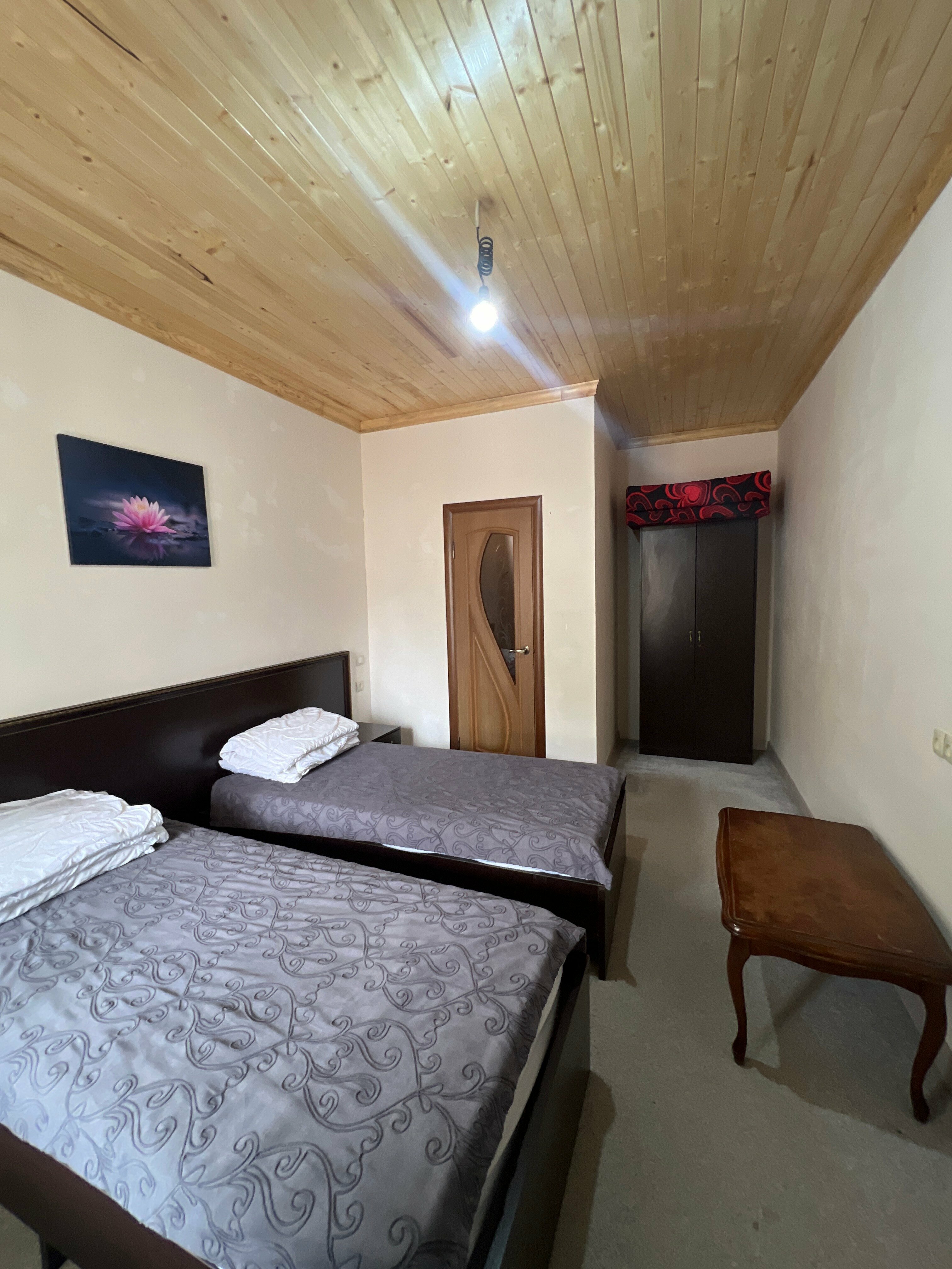 Двухместный номер с 2 отдельными кроватями и окном