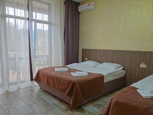 Трехместный номер с балконом