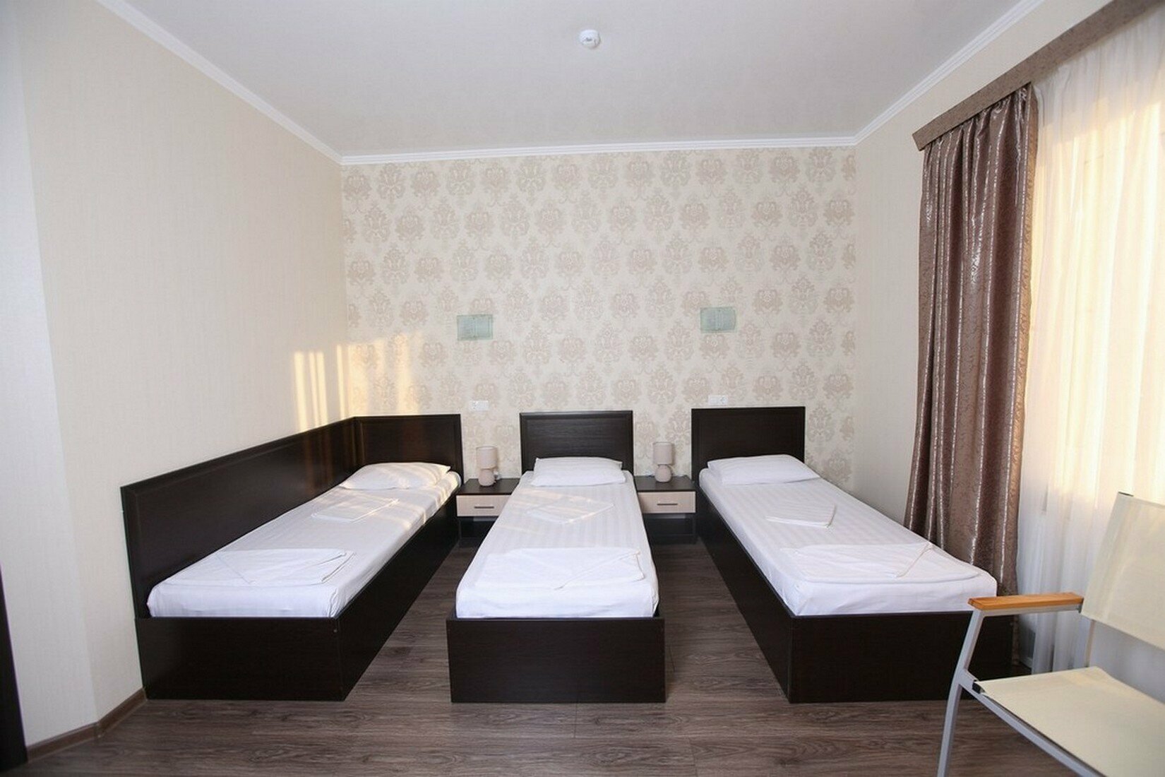 Стандарт трёхместный с видом на море, с 3 односпальными кроватями