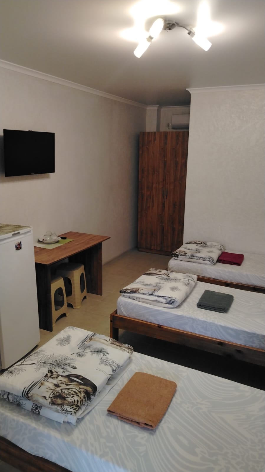 трехместный номер с тремя односпальными кроватями