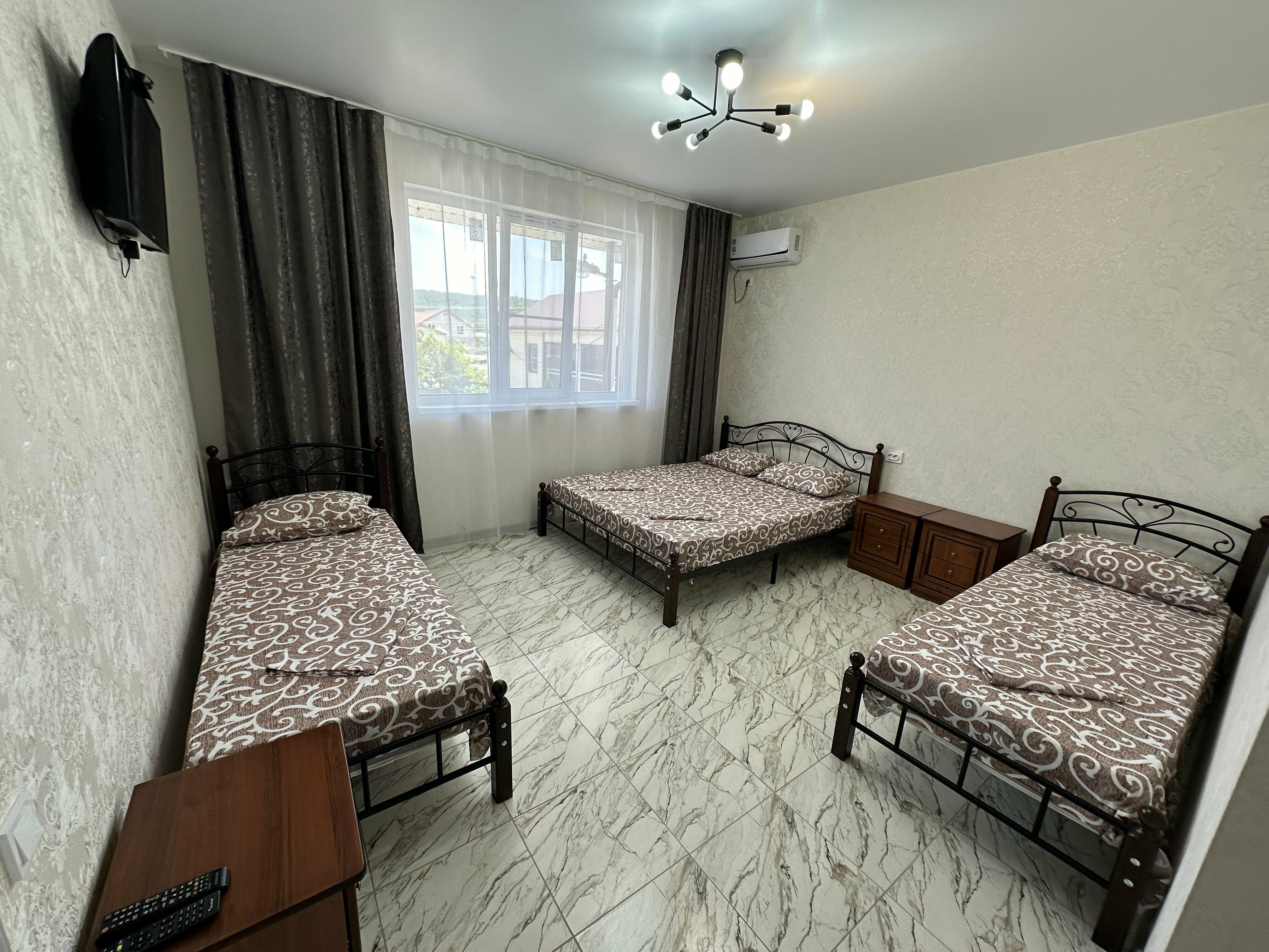 Улучшенный четырехместный номер