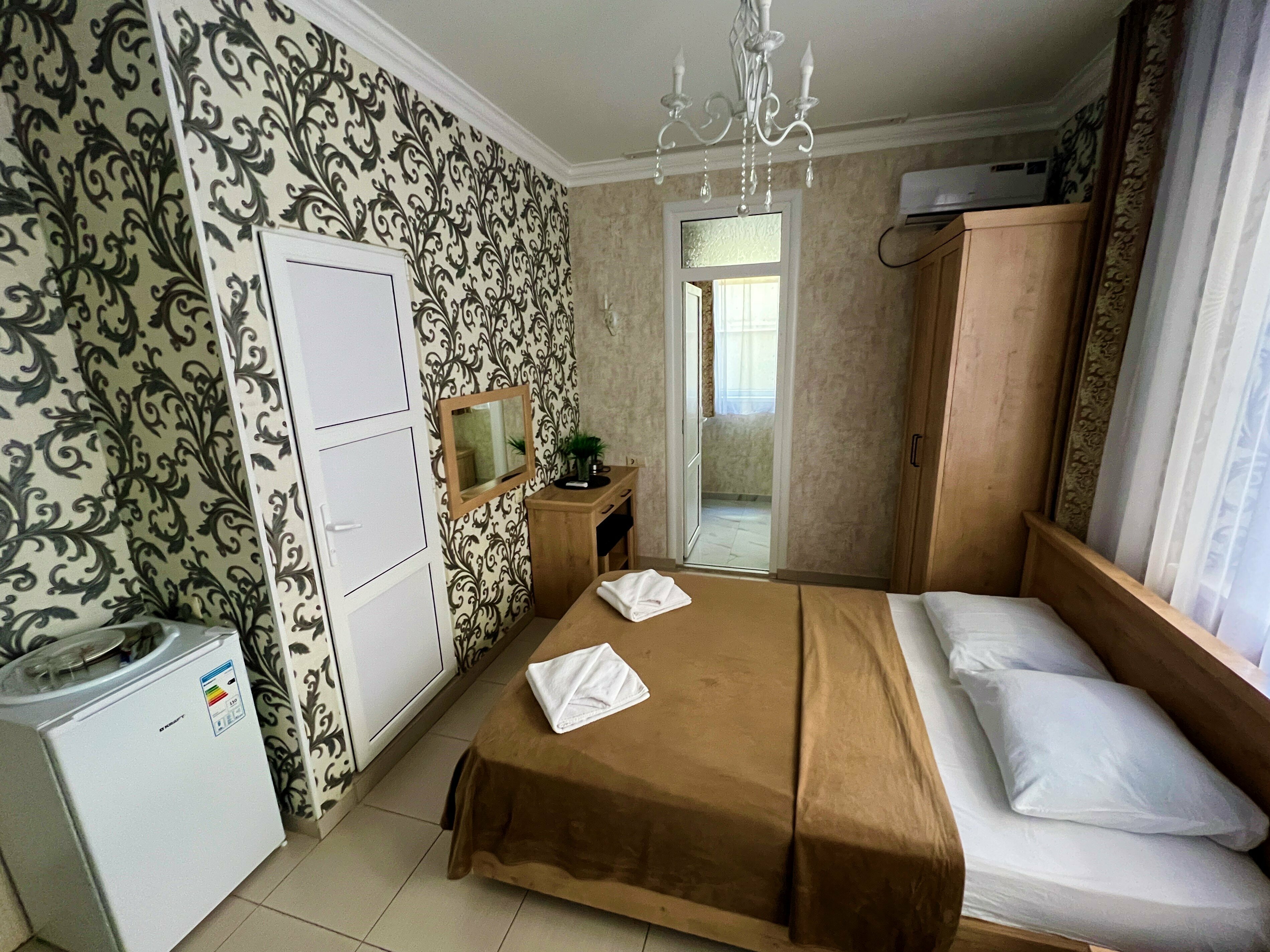 Трехместный номер с балконом