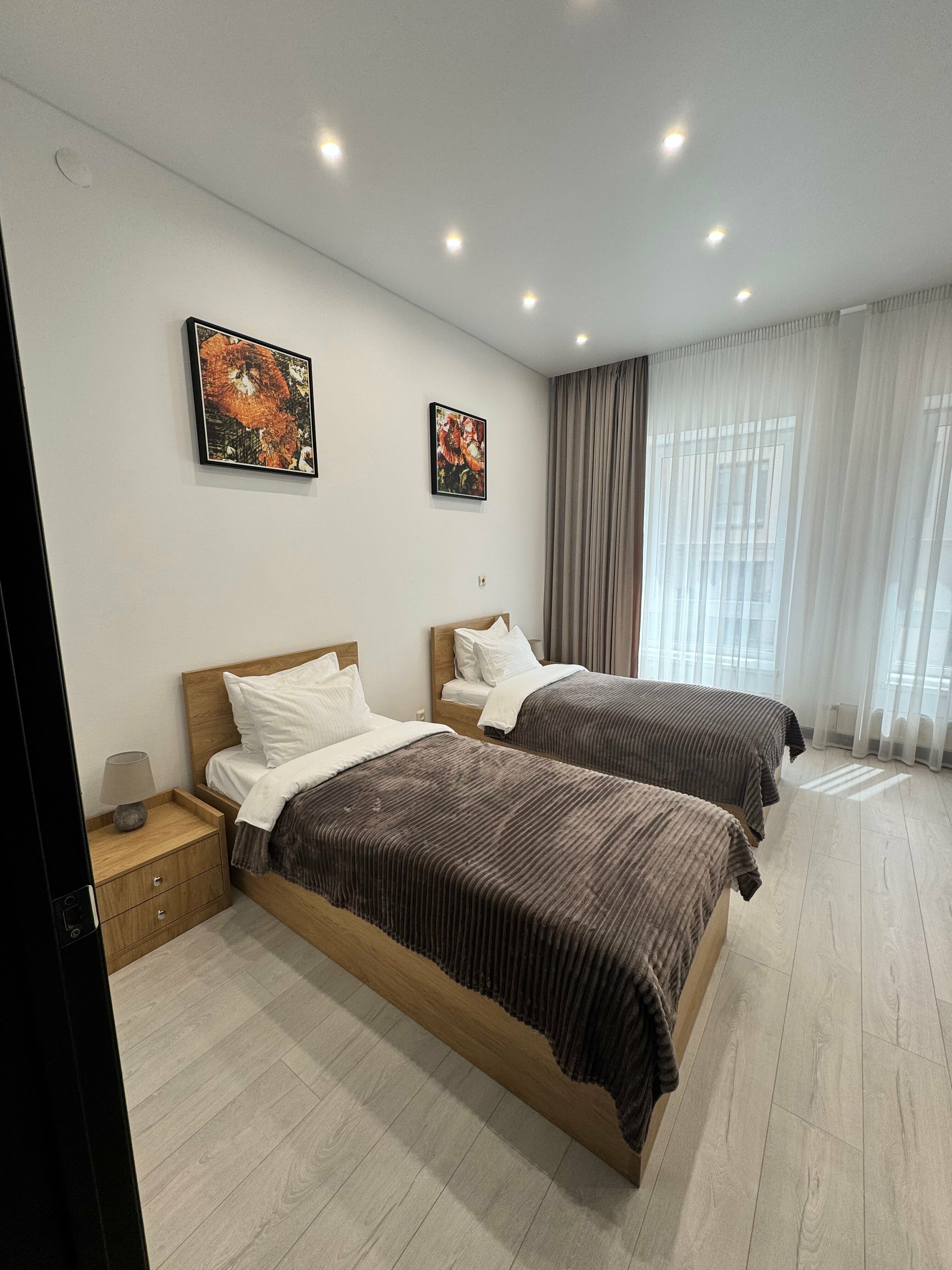 Студия с двумя раздельными кроватями