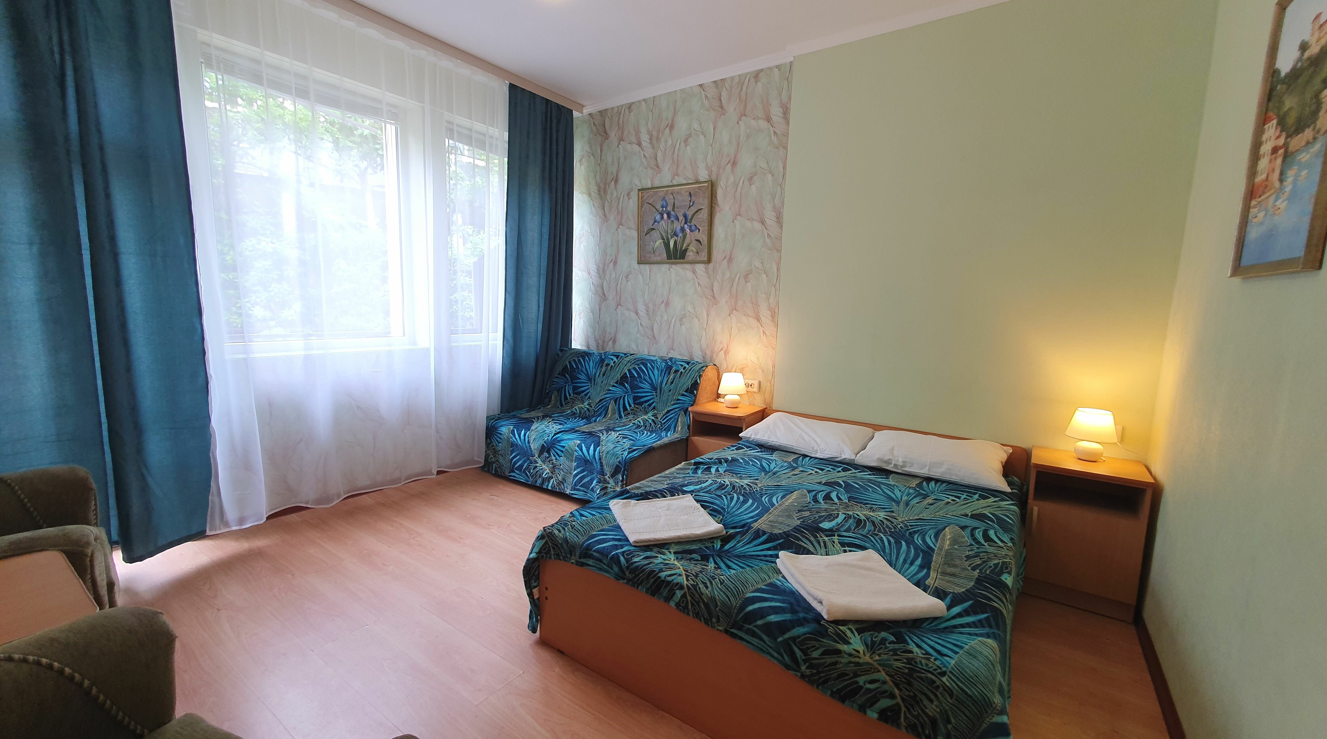 Четырехместный номер с балконом