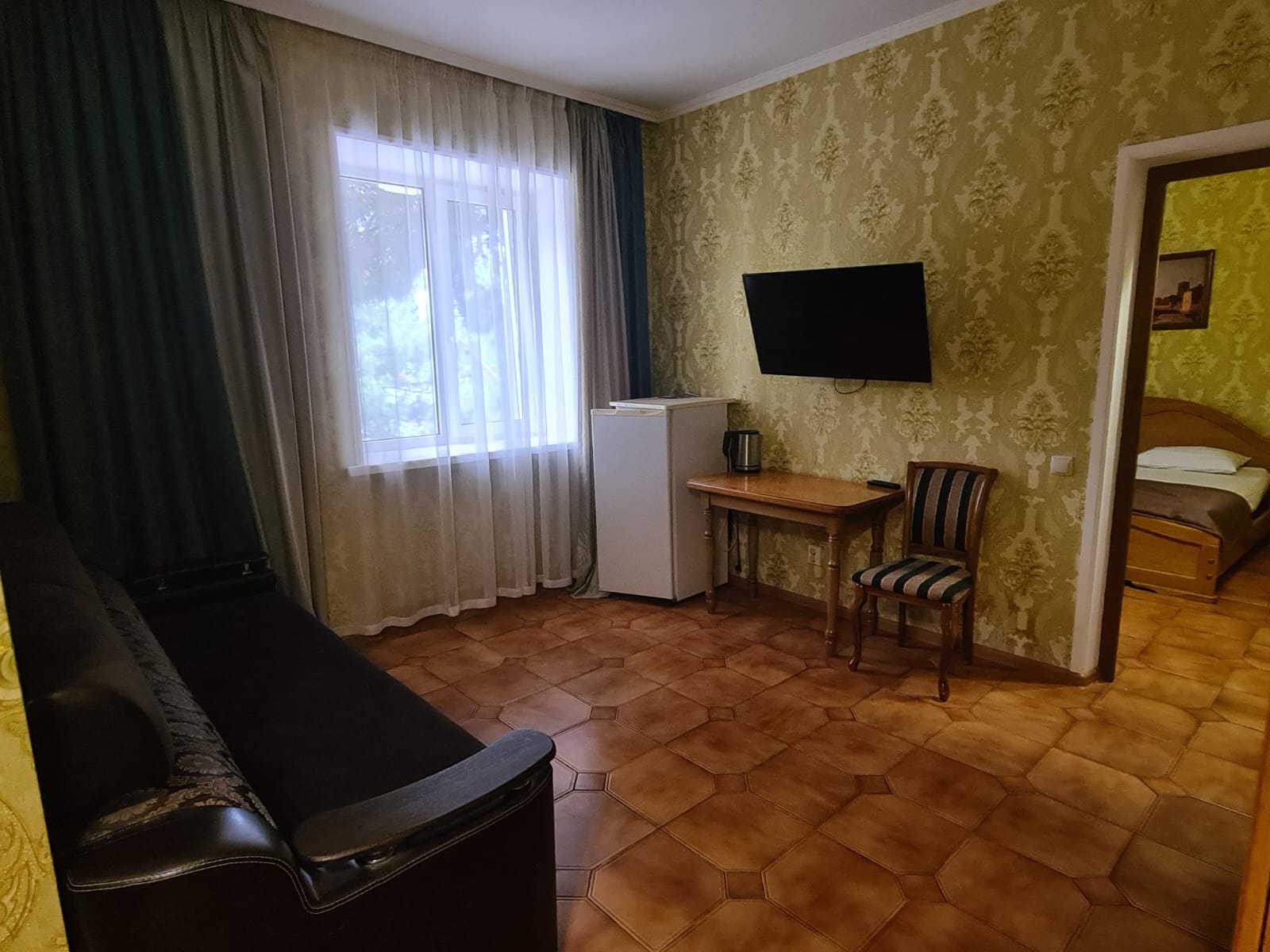 Улучшенный трехместный номер