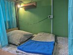 Общий номер для мужчин и женщин с 8 кроватями в Визит