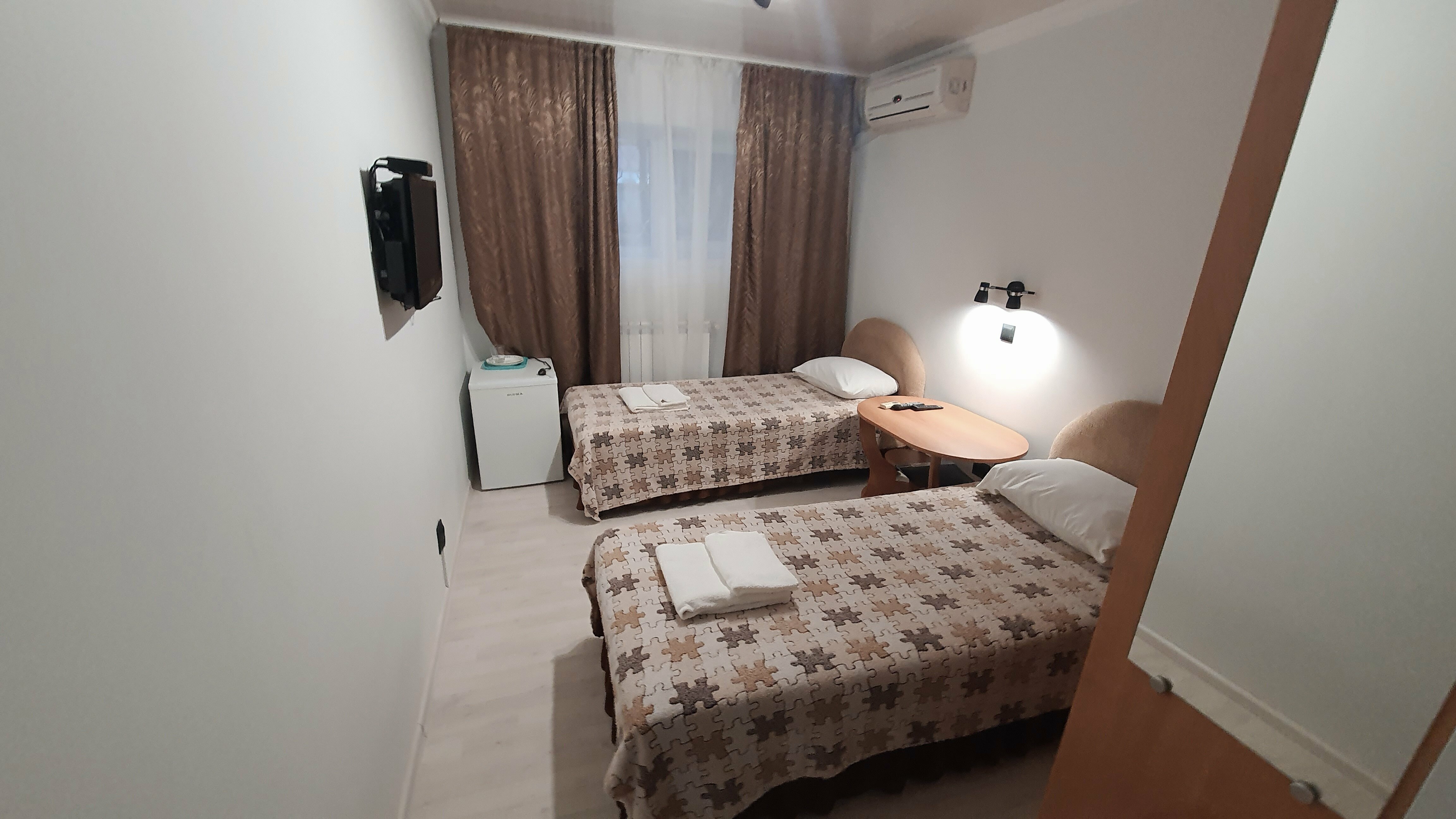 Двухместный "Стандарт" с одной двуспальной или двумя односпальными кроватями