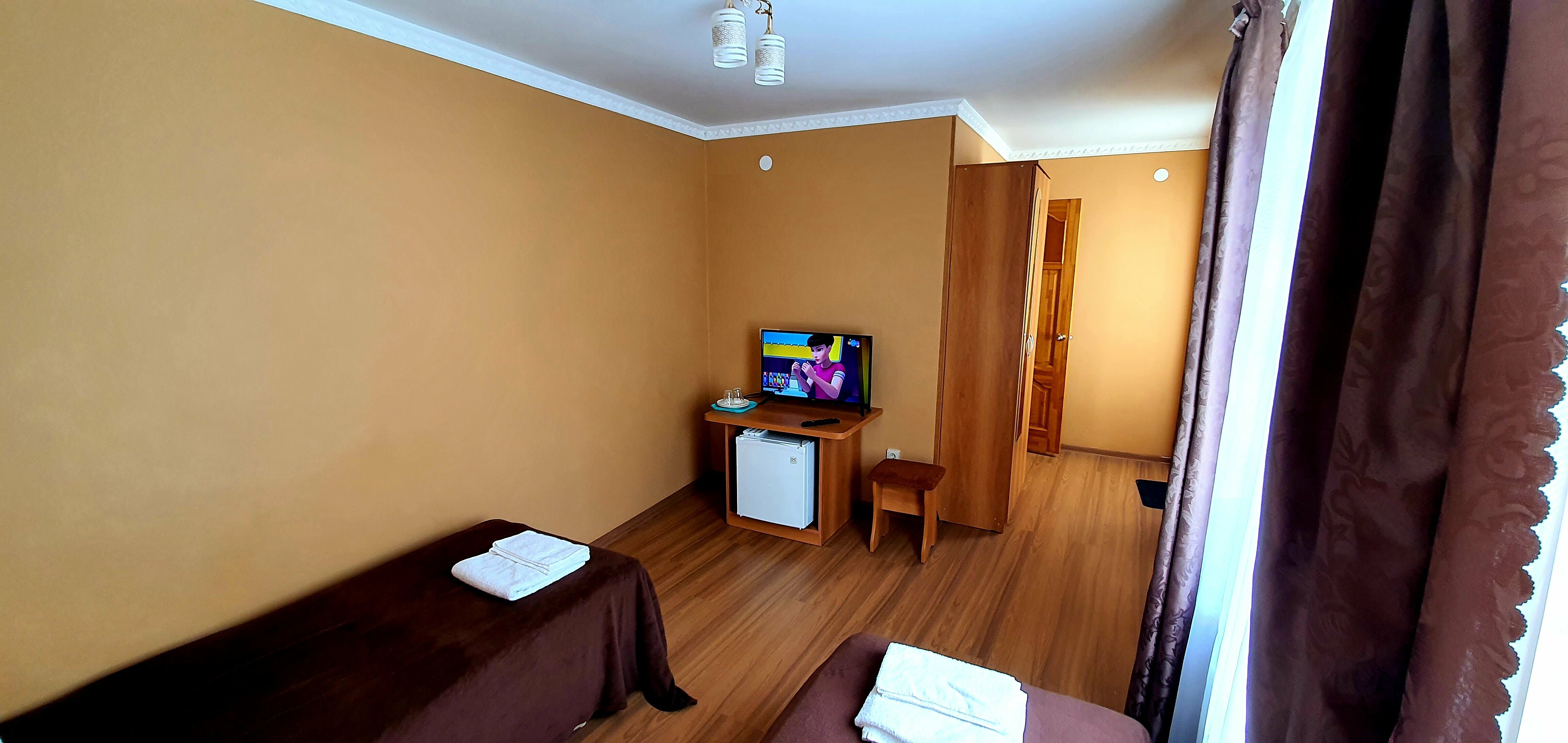 Улучшенный двухместный "стандарт" с 1 двуспальной или 2 односпальными кроватями