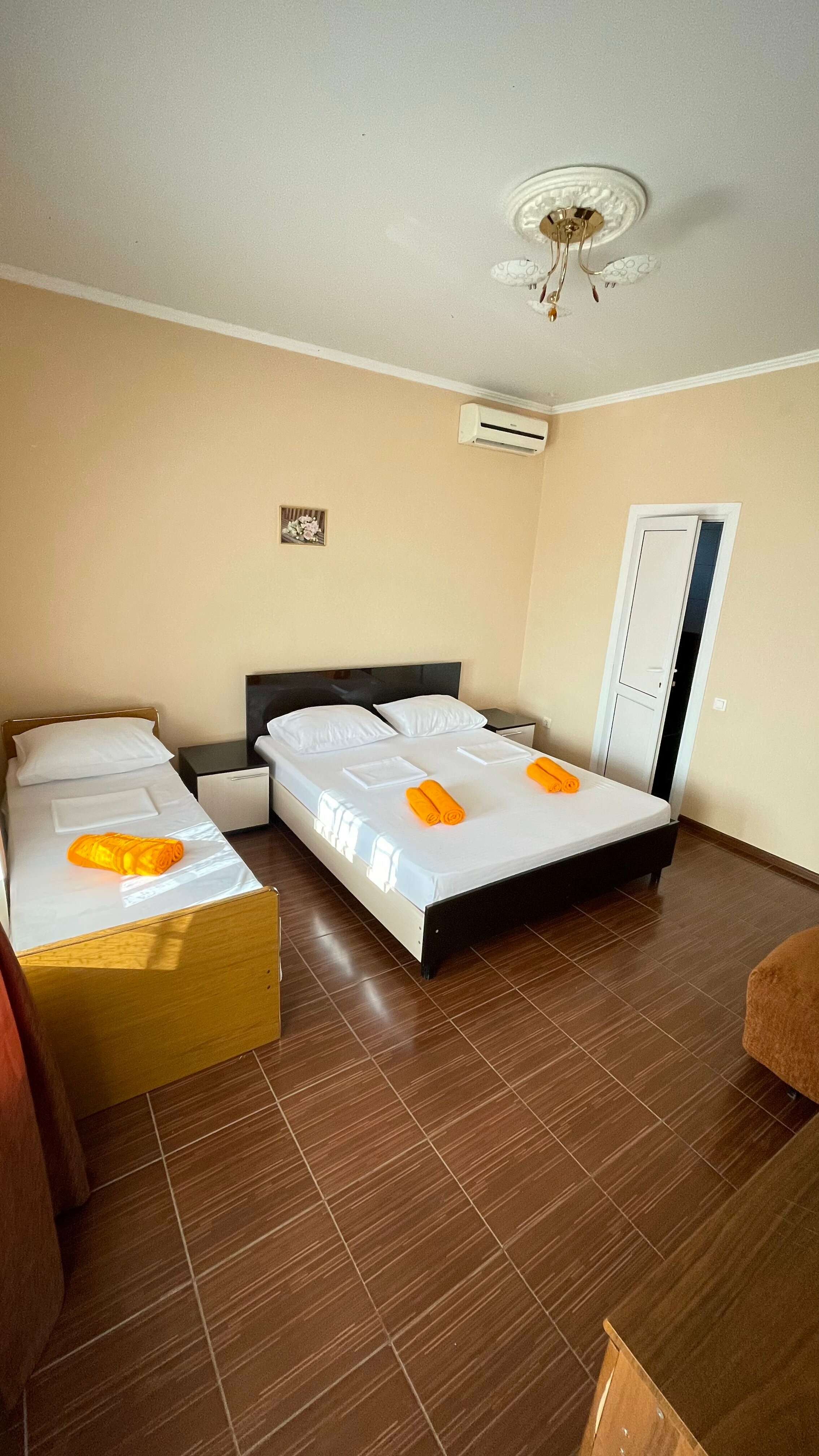 Трехместный номер с балконом