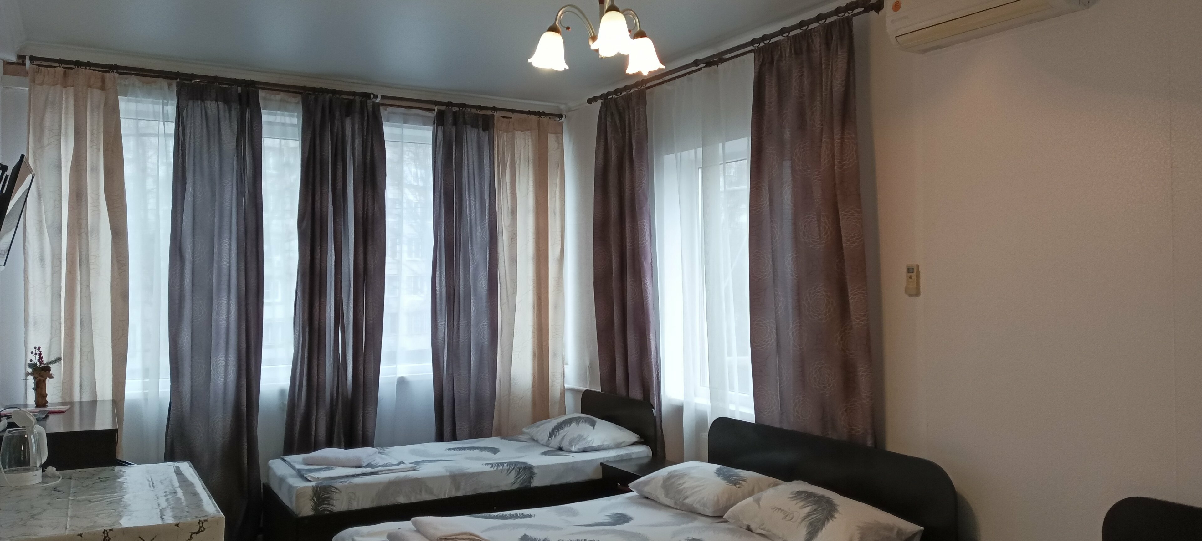 Семейный номер с видом на сад