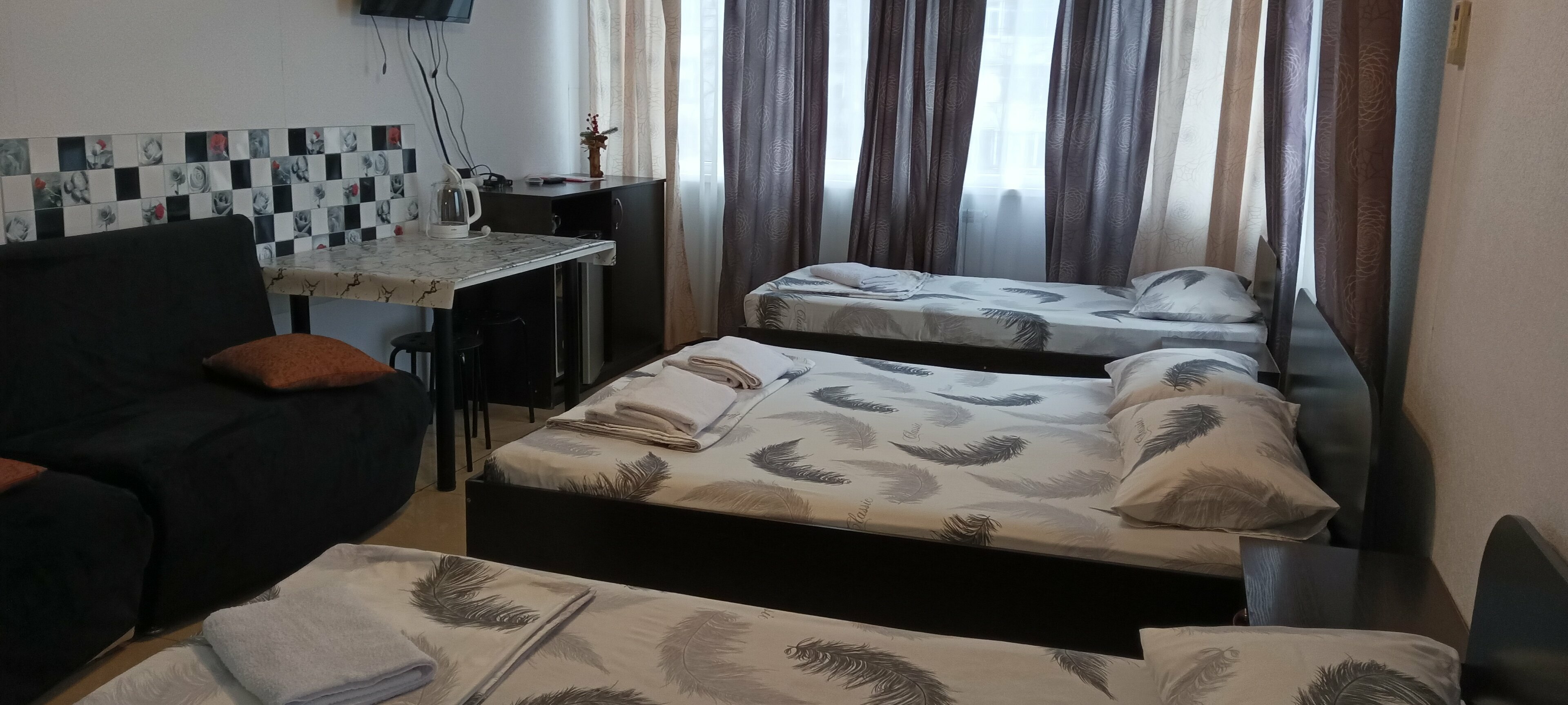 Семейный номер с видом на сад