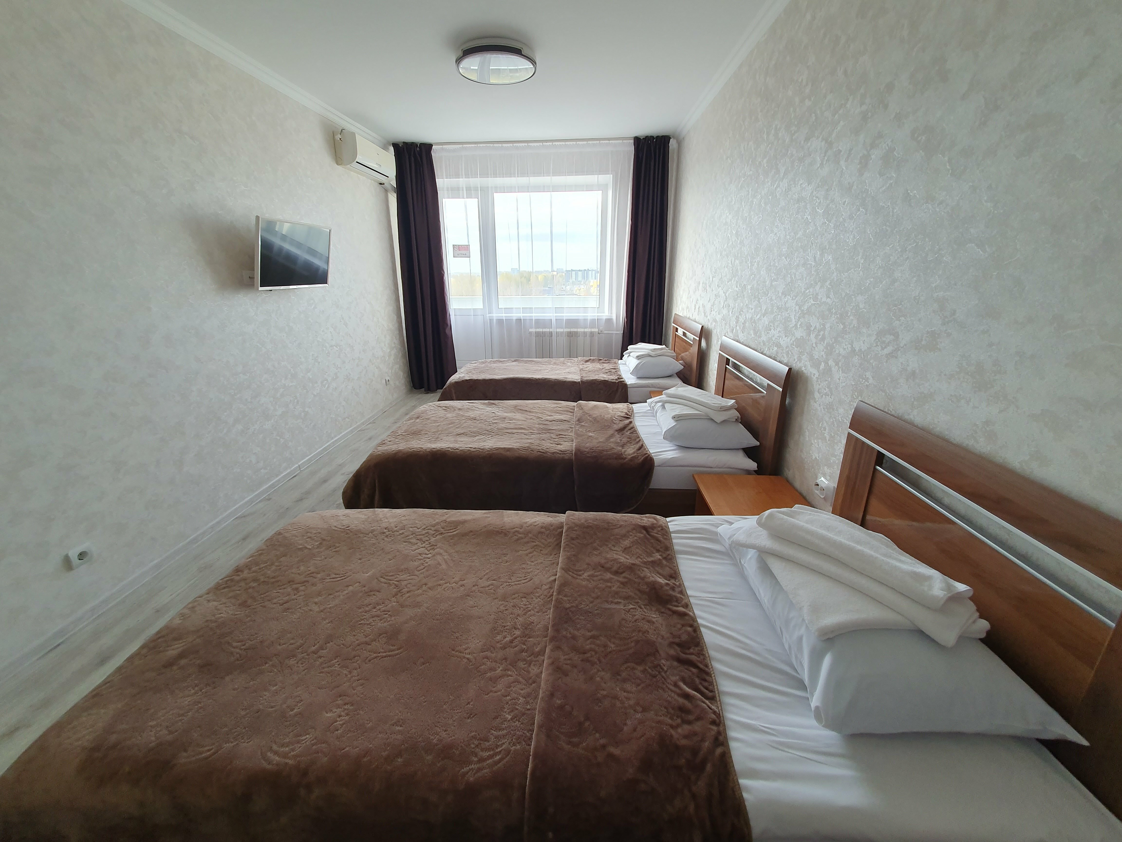 Односпальная кровать в общем номере