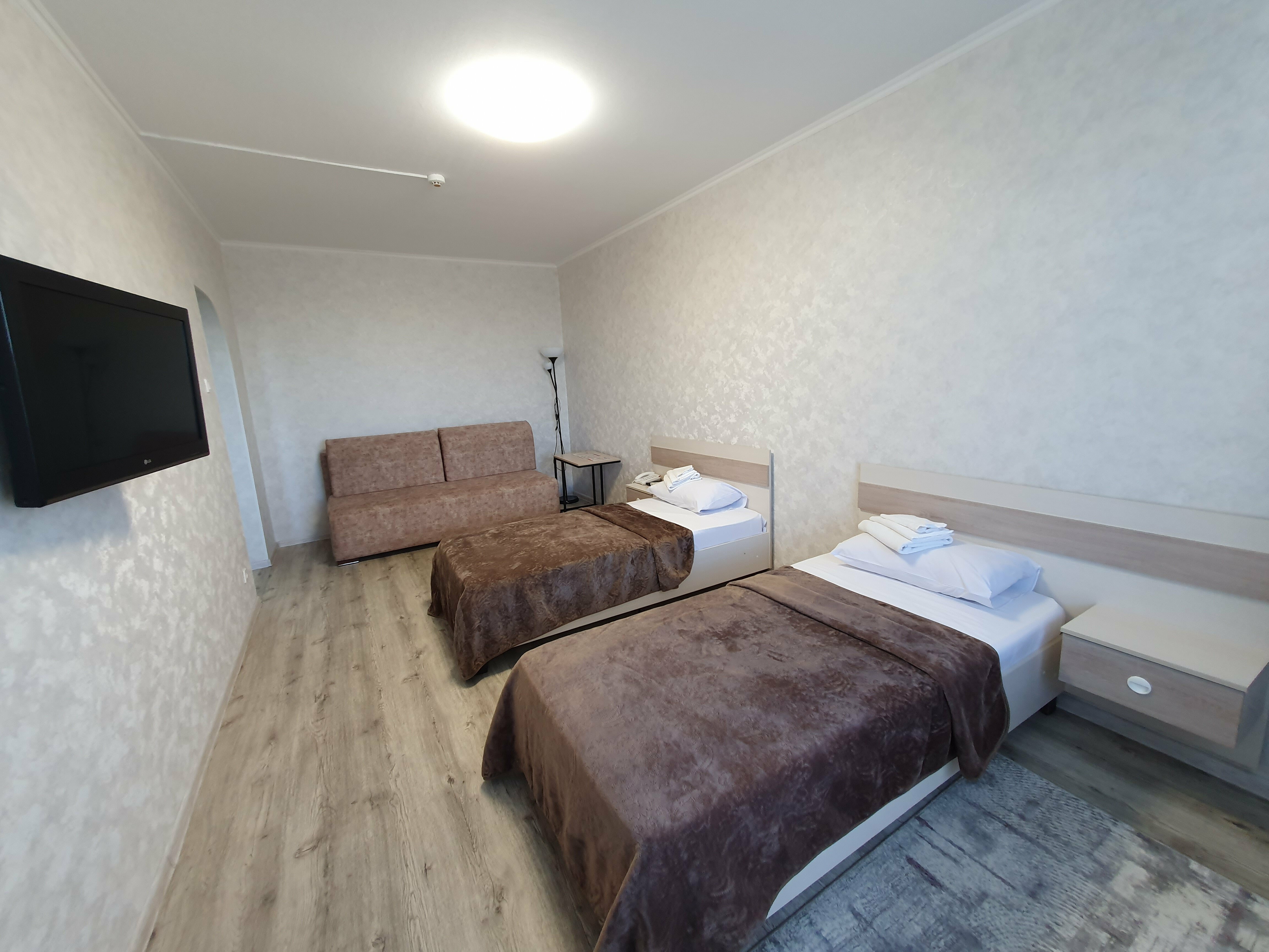 Односпальная кровать в общем номере