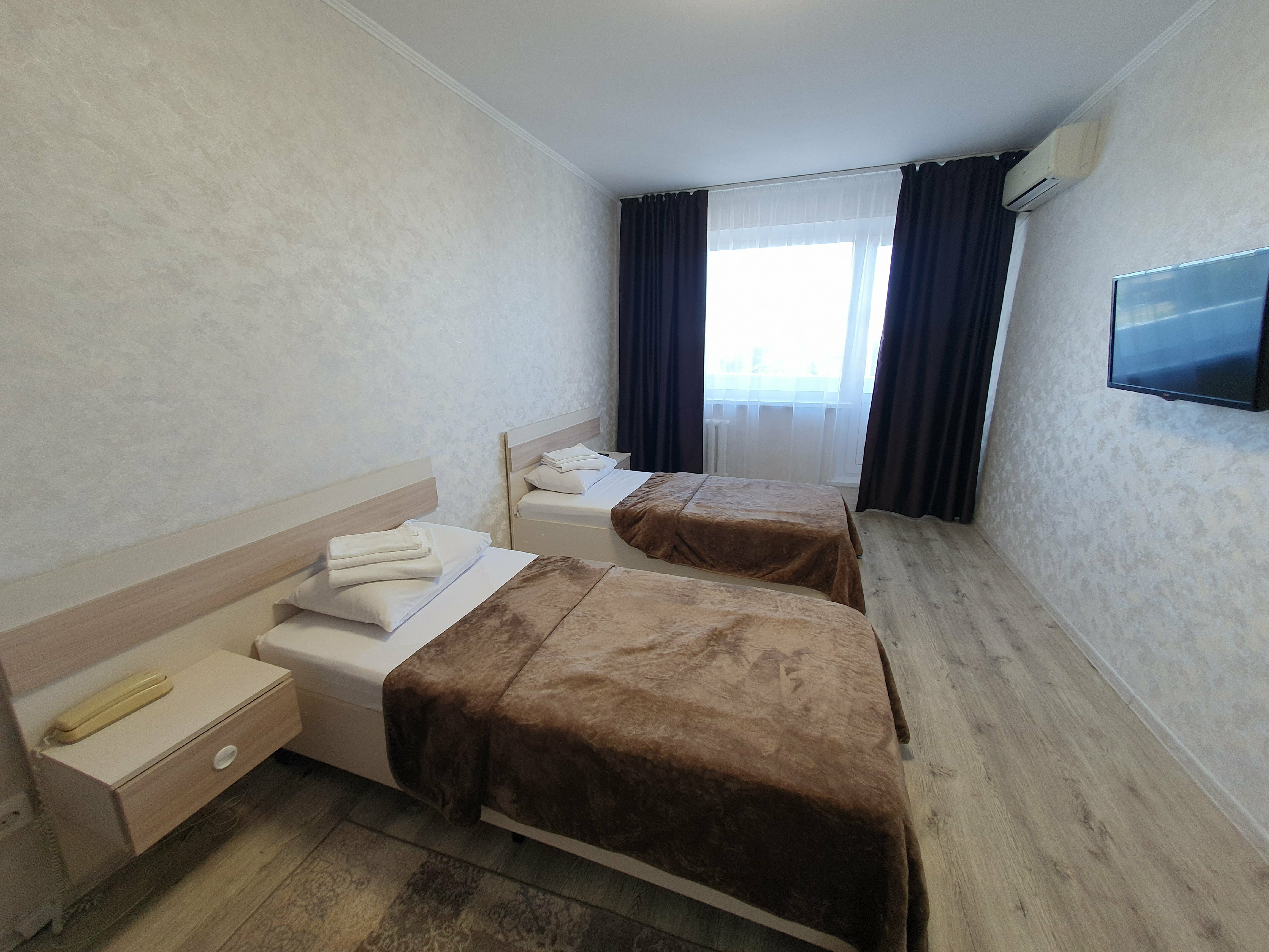 Односпальная кровать в общем номере