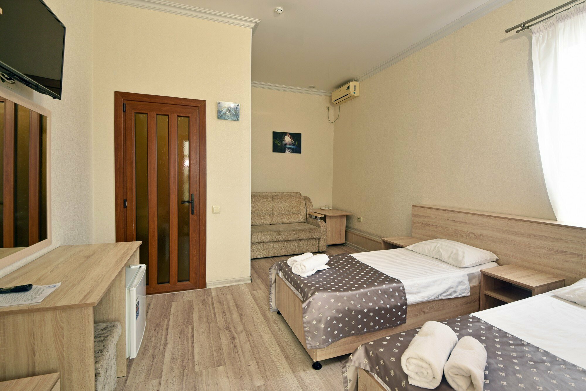 Улучшенный четырехместный номер