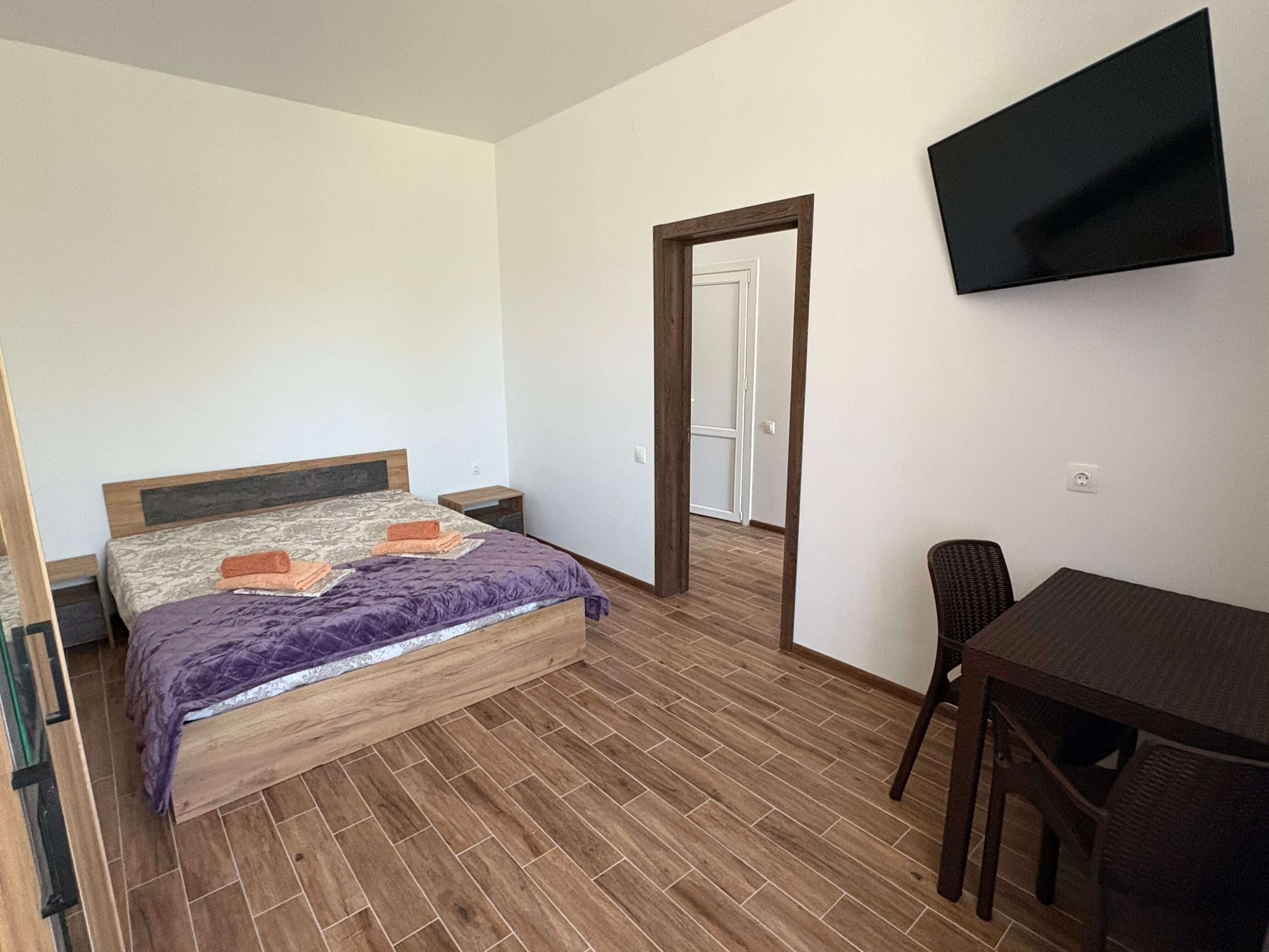 Четырехместный двухкомнатный номер с балконом