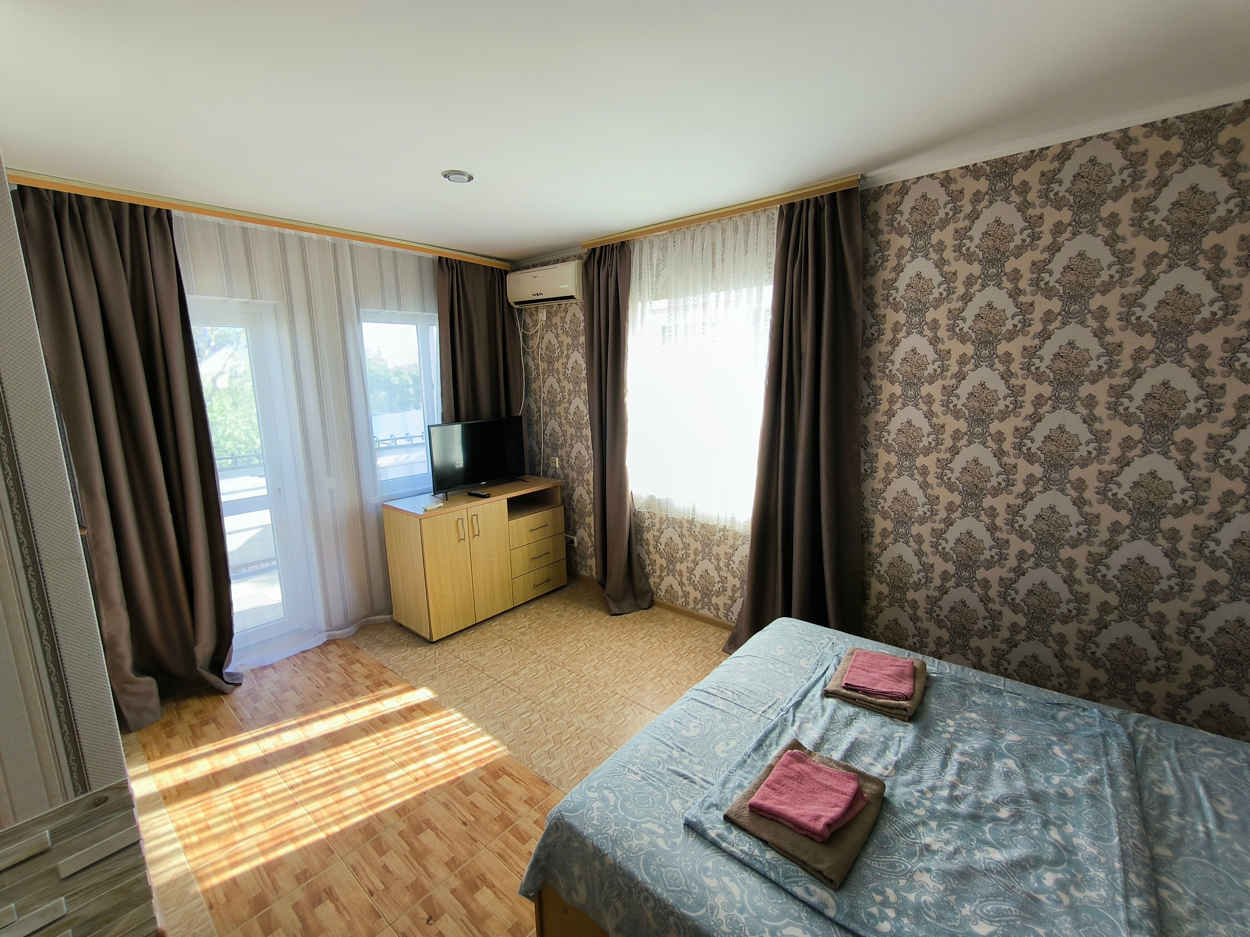 Трехместный номер с балконом