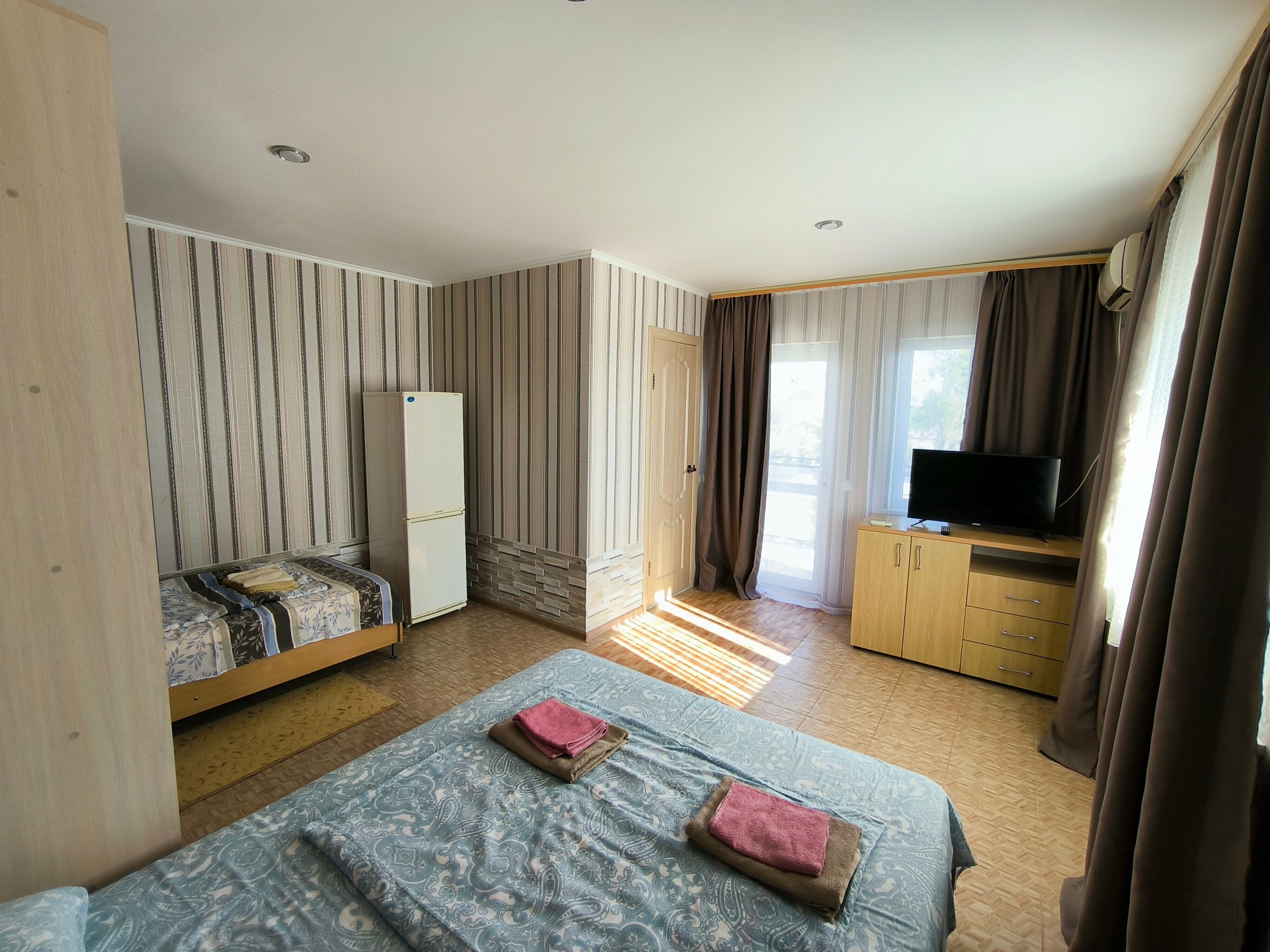 Трехместный номер с балконом