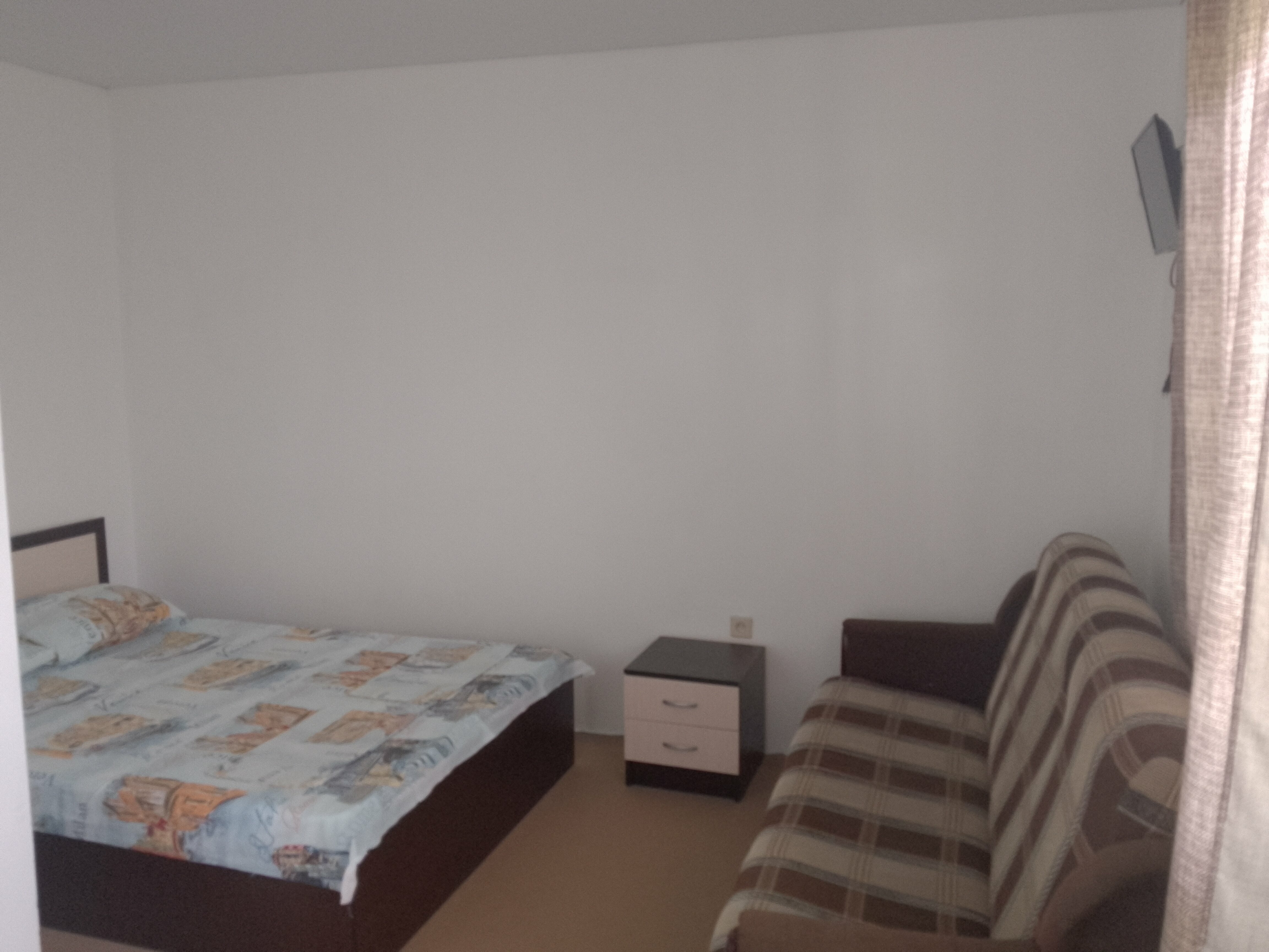 Двухместный номер с 1 кроватью, балконом и видом на горы.