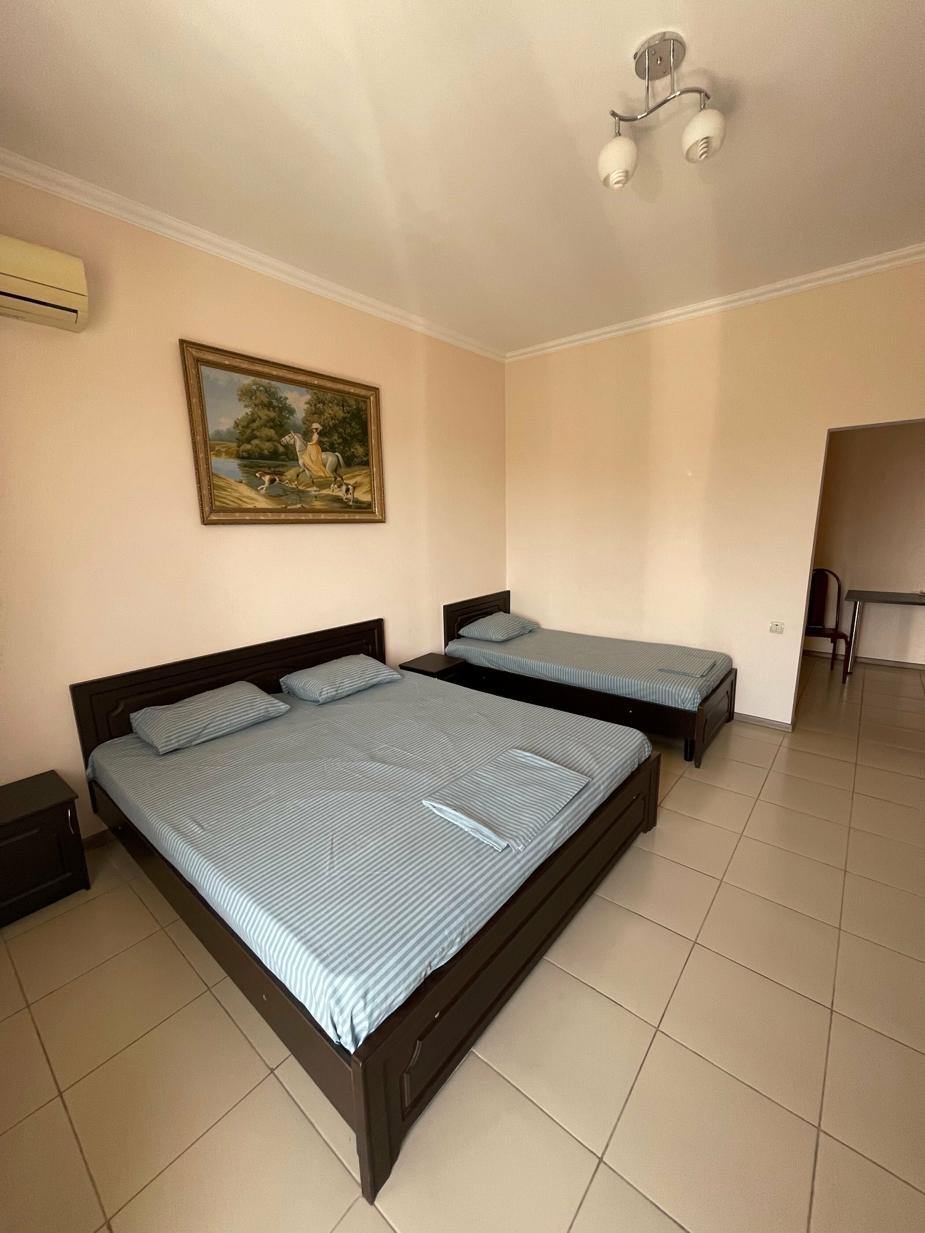 Трехместный номер с балконом