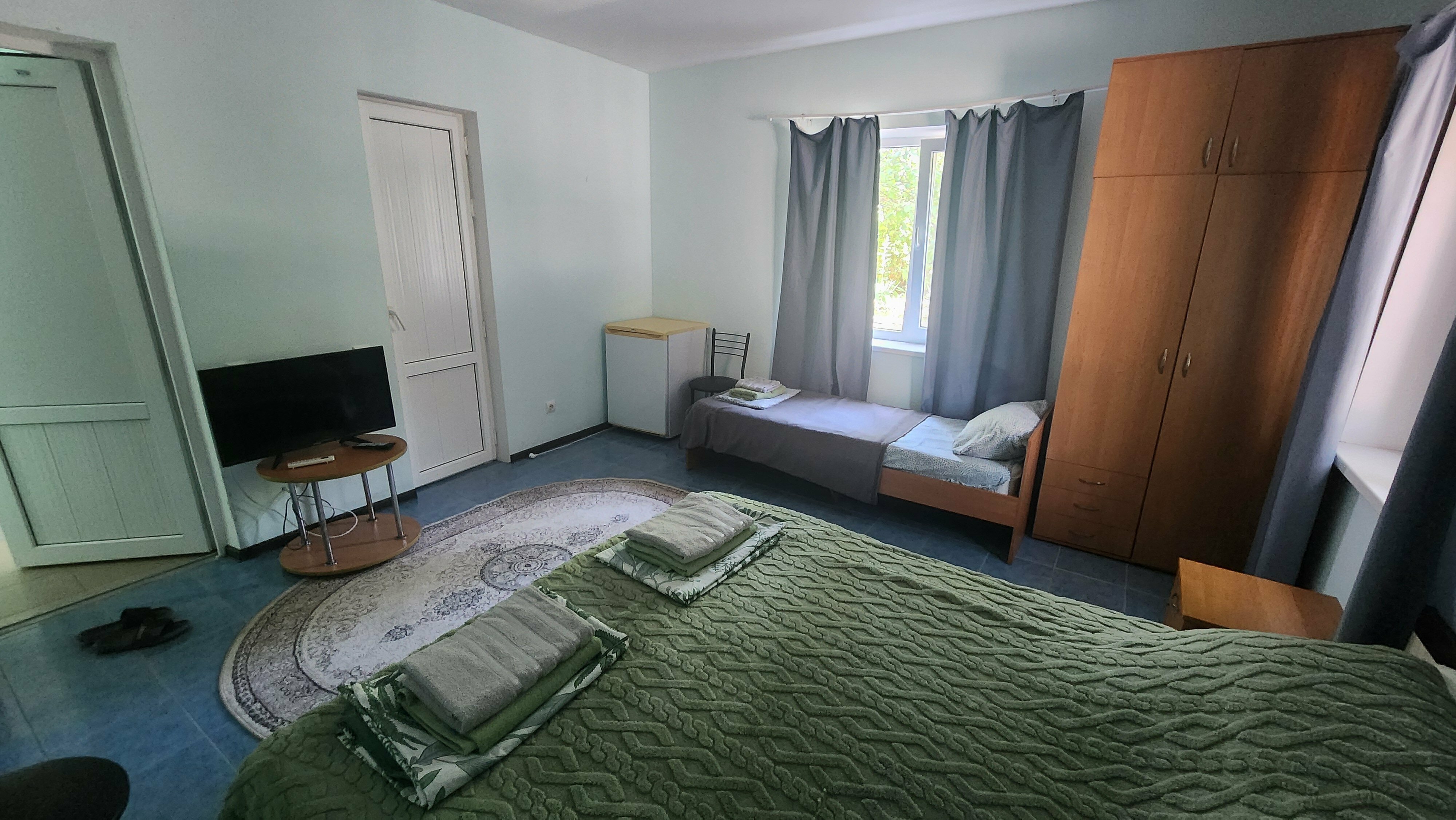 Трехместный номер Делюкс