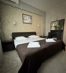 2-комнатный номер люкс семейный с 1 двуспальной кроватью и диваном #306 в Оникс