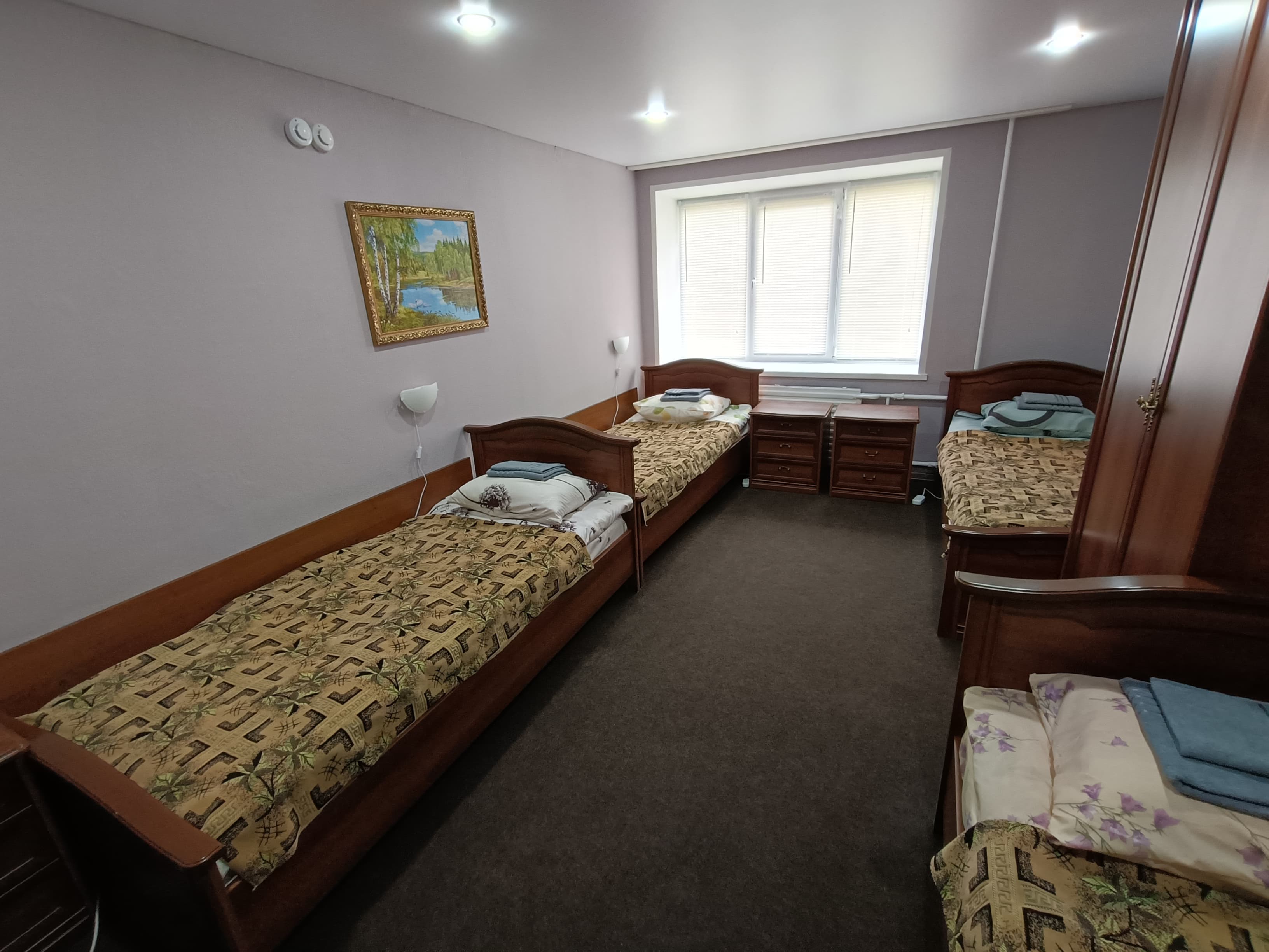 Четырехместный номер с общей ванной комнатой