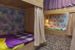 Кровать в общем 6-местном номере для мужчин и женщин в Смарт-хостел Сова