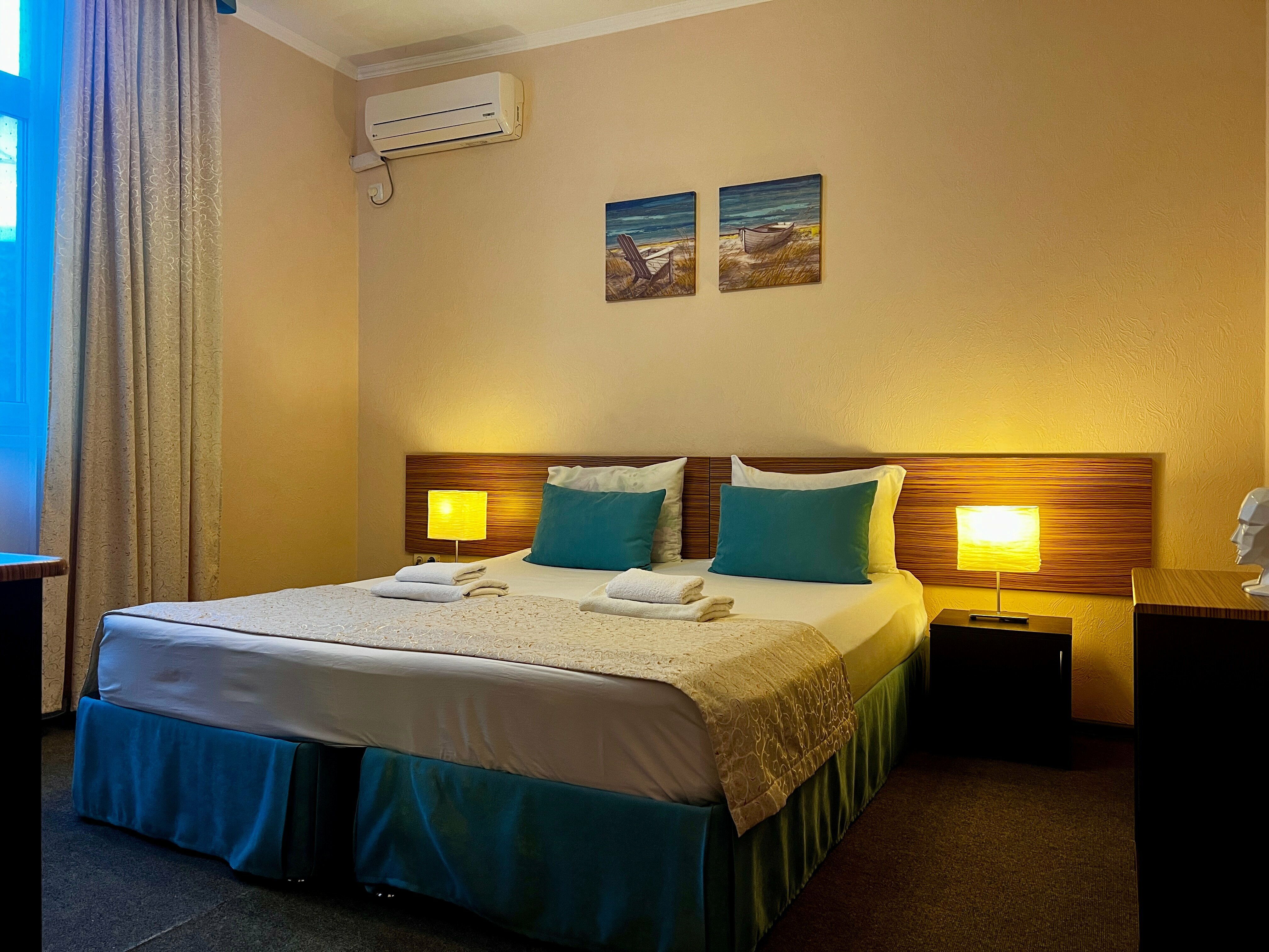 Стандартный двухместный номер с 1 кроватью или 2 отдельными кроватями