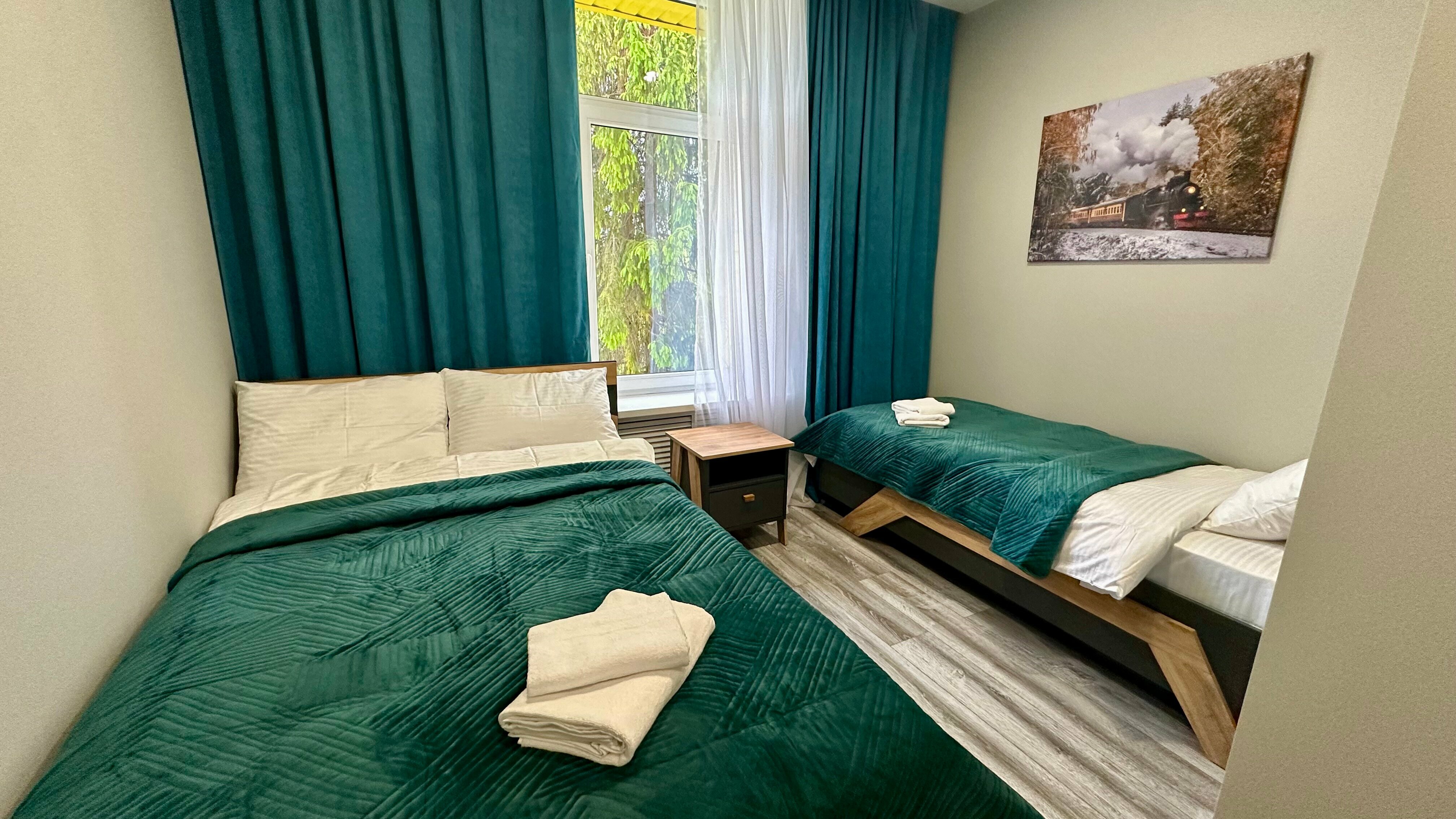 Двухместный номер с 2 отдельными кроватями и душем