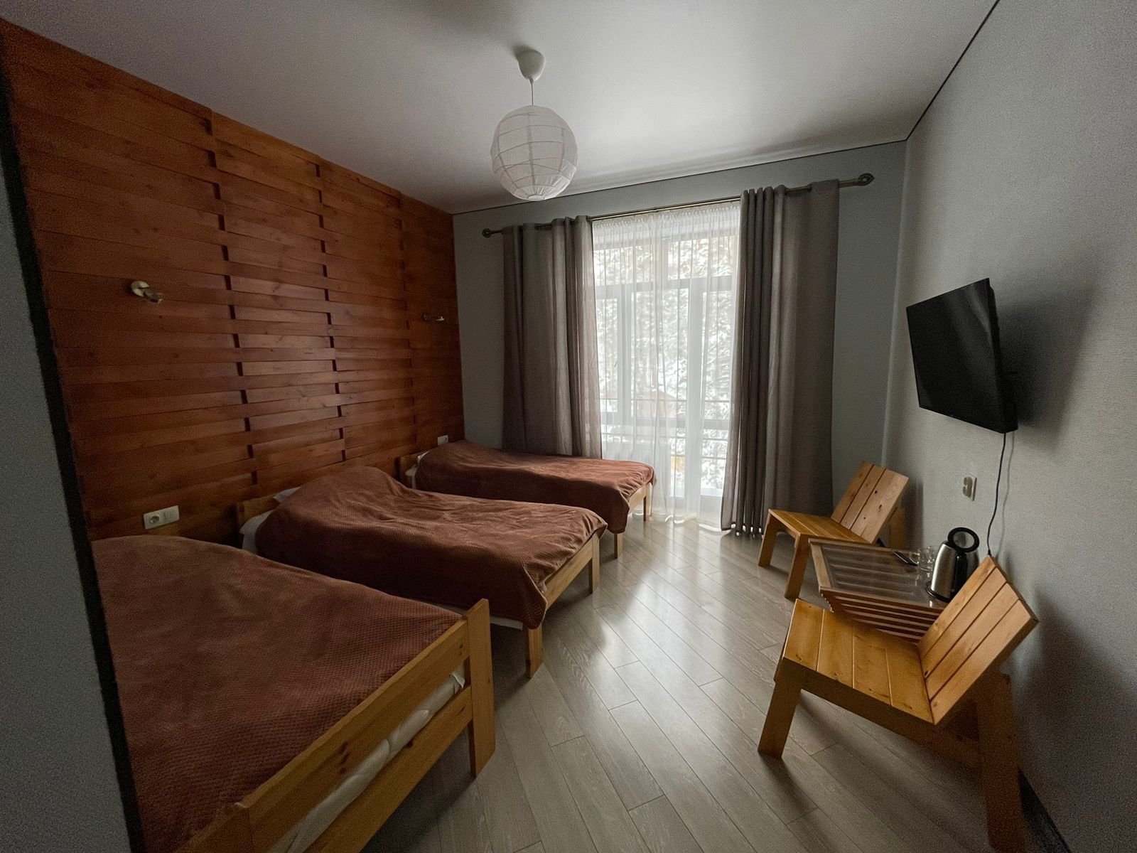 Трехместный номер с балконом