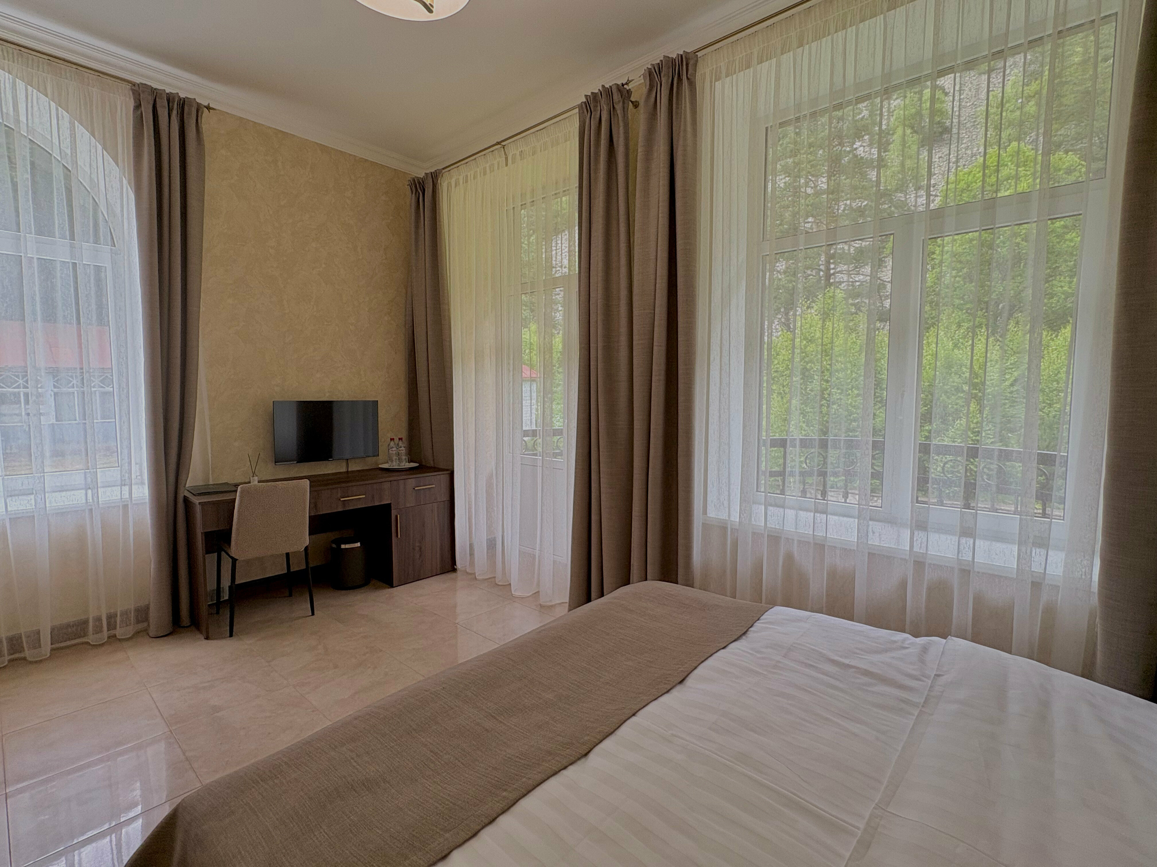 Улучшенный двухместный номер с 1 кроватью