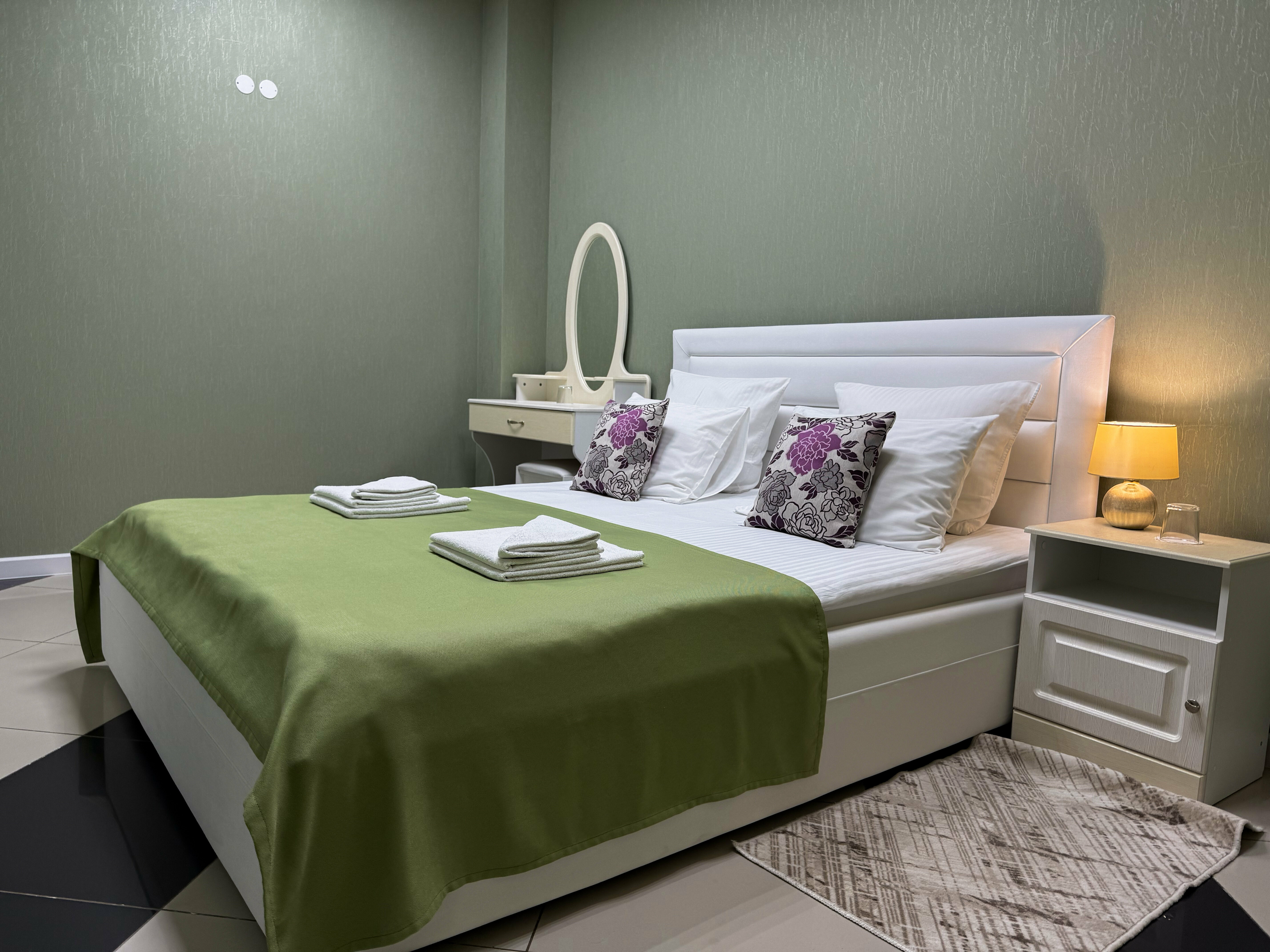 Четырехместный номер Делюкс