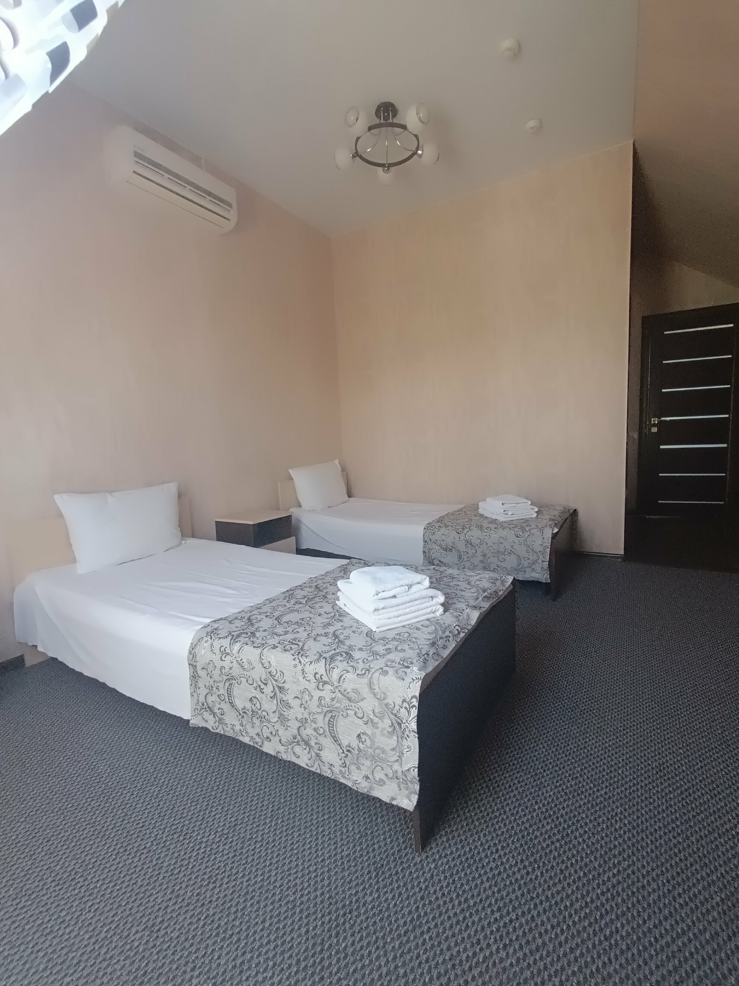 Трехместный номер с тремя кроватями