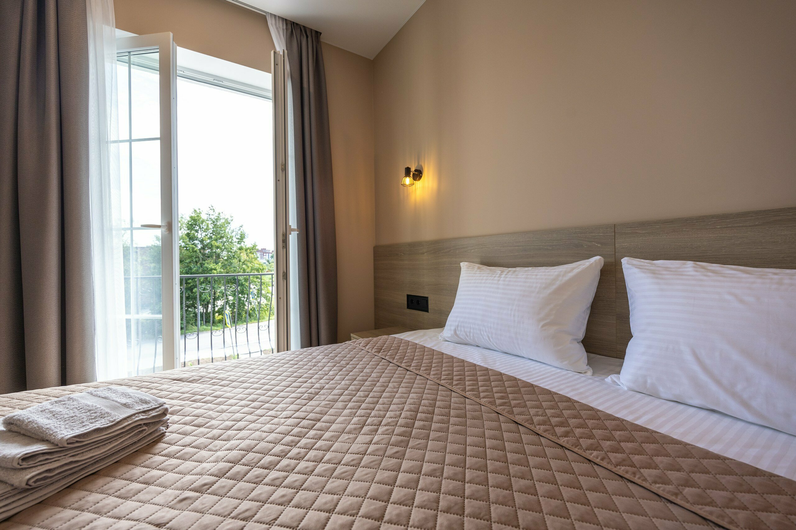 Трехместный номер с балконом