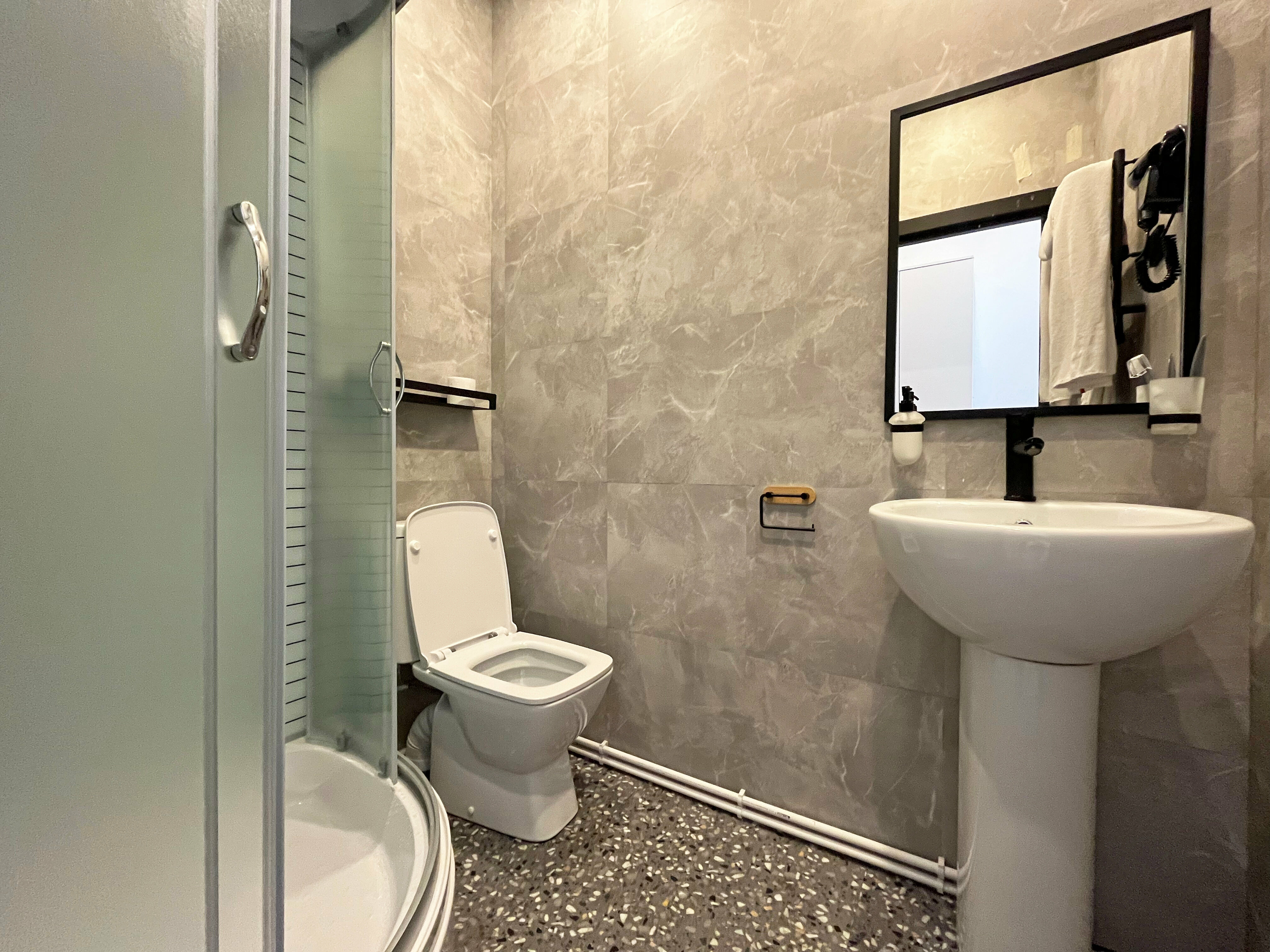 Стандартный улучшенный двухместный номер с одной большой или двумя односпальными кроватями