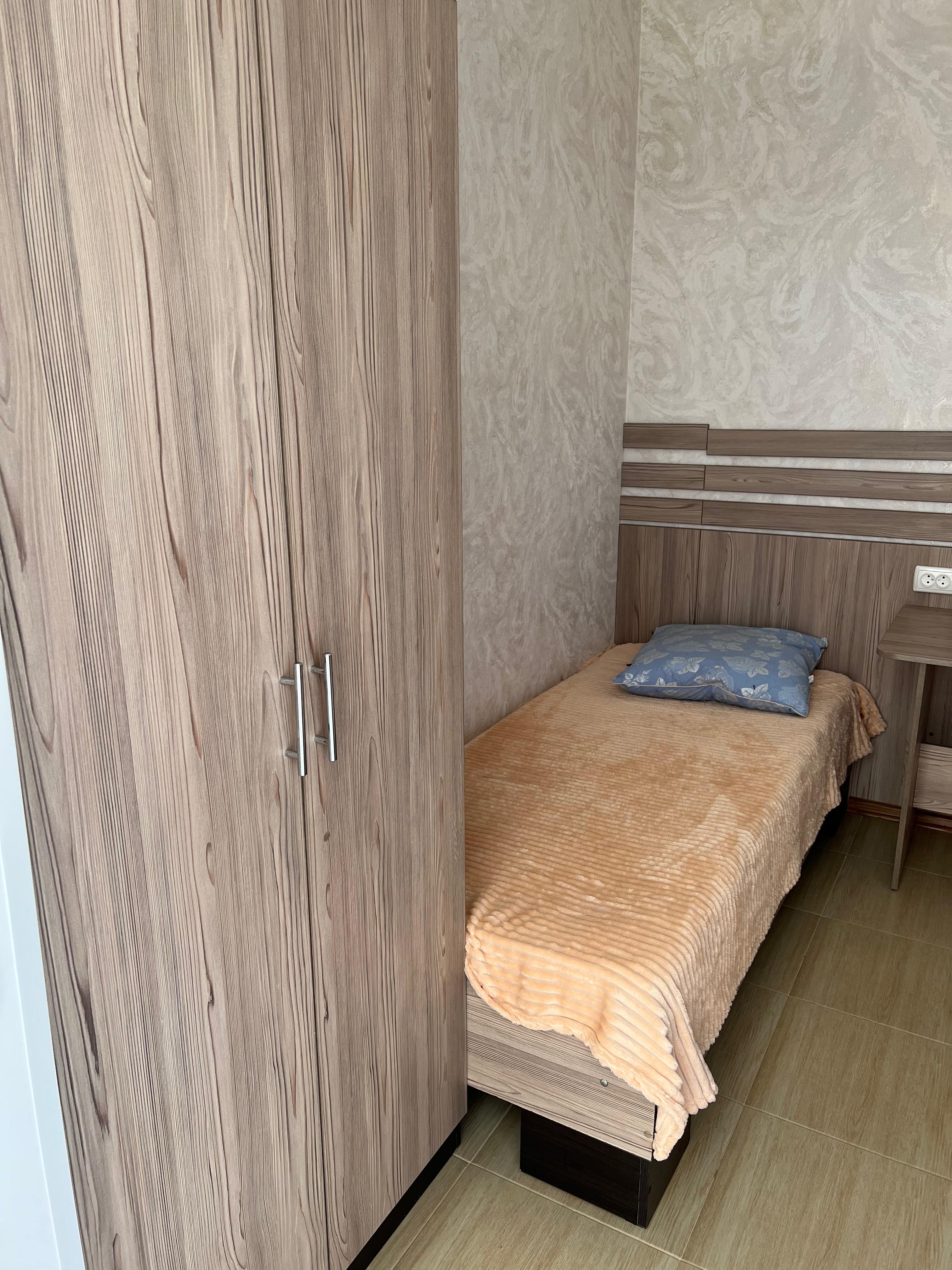 Трехместный номер с балконом